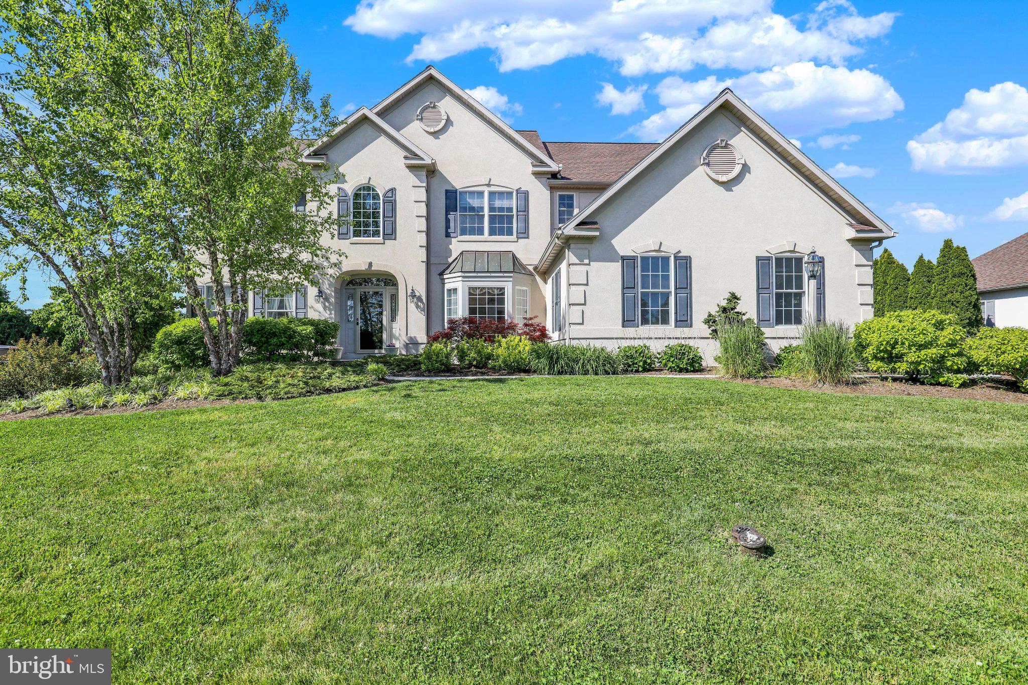 Stunning home in the popular Wilson Schools Community - Rosewood Hills.  Lot's of space to spread out in this extremely well kept home with 2 story foyer and 2 story overlook into the breakfast/sunroom area.  1st floor Laundry, office/craft room, and powder room.  If you wanted to, the office is big enough to make a 1st floor bedroom if you ever needed it.  Spacious formal dining room... Cozy formal living room and a very large family room!  Kitchen with granite countertops, multi tiered upper cabinets, newer appliances and plenty of space to cook and entertain at once!  Deck and Patio off of the sunroom area. Rear yard is awesome because it appears to go on and on and on... common area after the rear yard is amazing!!  Basement is finished with wet bar, powder room, movie projector and movie screen that comes down automatically.  Oh and there's another gas fireplace in the basement finished area.  2nd floor has all the bedrooms and they are all very nicely sized.  There's loft area that they are using as an office loft area.  2nd floor catwalk to the owners bedroom looks in the 2 story breafast are and into the sunroom.  Very large owners suite with luxury bathroom complete with large tube and ceramic tile shower and double vanity.  There's a separate sitting area and a large walkin closet!! Check out the pics they do a better job than my description.