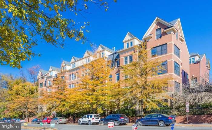 Luxury townhome w/2 car garage just 3 blocks to Clarendon Metro. The home spans four levels w/4 bedrooms (or 3 bedrooms and den) and 3 1/2 baths.  Hardwoods on 2 levels with expansive & sunny living spaces w/bright open gourmet kitchen. The primary suite occupies the entire 3rd level including spa like bathroom and large walk-in closet. The top floor secondary bedrooms offer plenty of closet space and share a hall bath. Laundry is conveniently located on this level with full size washer and dryer. The home features tall 9 ft+ ceilings and recessed lighting. Recent HVAC and appliances. Entry level Den/4th Bedroom with ensuite full bath is perfect for home office, exercise room or nanny suite. Fantastic location walking distance to everything Clarendon has to offer. Keep the cars at home and walk to dozens of dining, shopping and entertainment options. Easy access to Washington DC and major commuter routes and minutes to Reagan National Airport. Showings by appt only!