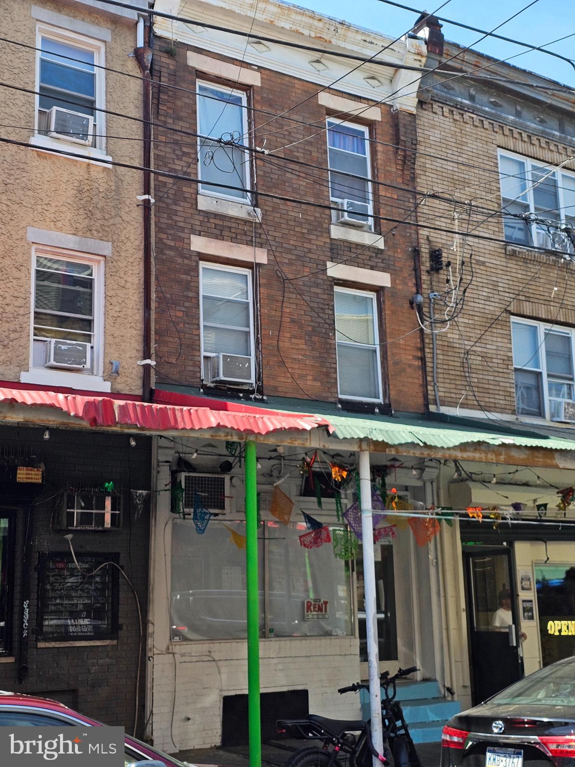 Located in a vibrant, highly sought-after Philadelphia neighborhood (Italian Market), this turn-key mixed-use property offers an exceptional investment opportunity. Featuring a well-maintained commercial space on the first floor and an updated, two-story, 2-bedroom apartment upstairs, this property is in good condition and promises immediate returns. Upstairs is already tenant-occupied, providing a stable income stream from day one.  Position your business or future tenant's business for success with a premier, vacant storefront featuring unbeatable foot traffic and endless possibilities in Philly's iconic Italian Market. This is an ideal opportunity for investors seeking a low-risk, high-reward property. The combination of a strong commercial location and  well maintained tenant occupied unit provides both stability and potential for appreciation. Do not miss your chance to own a piece of this flourishing Philadelphia community.