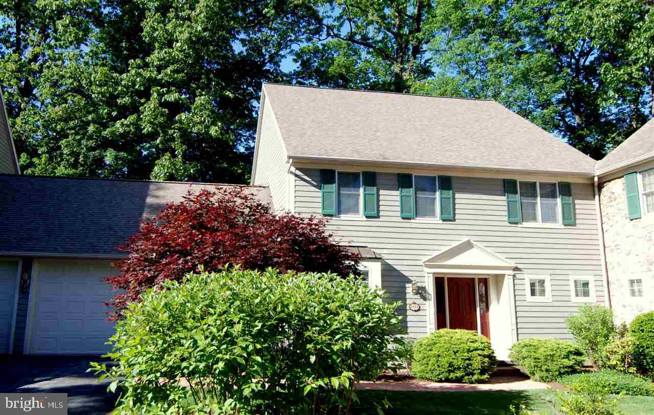 Pristine condo in Rosenmiller Woods. Quality & updates thruout; 2 sty Great Rm w/FP, built-ins & skylights. Wall of windows out to private patio. Fml Dining Area. Updtd Kitch w/granite & eat-in area. 1st floor Mstr Ste w/Spa bath/tub & walk-in shower. 2nd Flr offers Loft/den, 2 large bedrooms & Jack n Jill bath. Fin LL Family Rm. Access to Private Walking Paths.