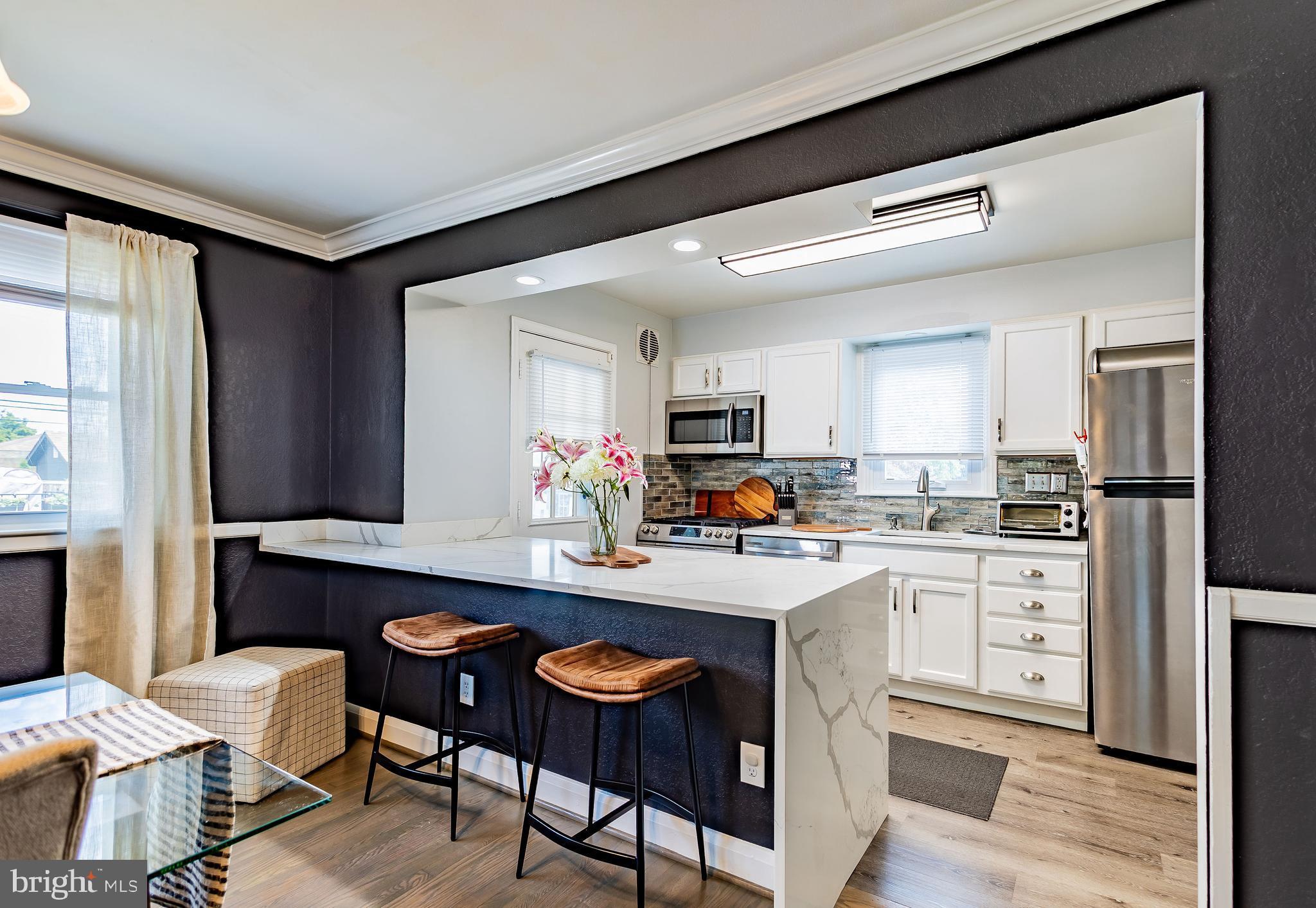 Recently renovated in 2020 and presently maintaining a modern-day aesthetics this cape cod is the restful retreat you have been waiting for and is situated among a quite community of homeowners that have established a  long history of stay.  The previous owner has taken the liberty of not only making this home pleasantly pleasing , but also worry-free to include new windows, new roof, new HVAC, and floors. 
The current owners has added upgrades that include the deck upgrade and a particle drain system to the basement.  

Built to last this beautiful stone structure has under went a small modification to include a open conceptual floorplan  and the layout is equipped to host small intimate gathering. The original fireplace serves as the central historical anchor of the living room and creates multi- sensory relation and a social connection for you and anyone fortunate enough to be a guest in your home.

Come see what else this charming beauty has to offer