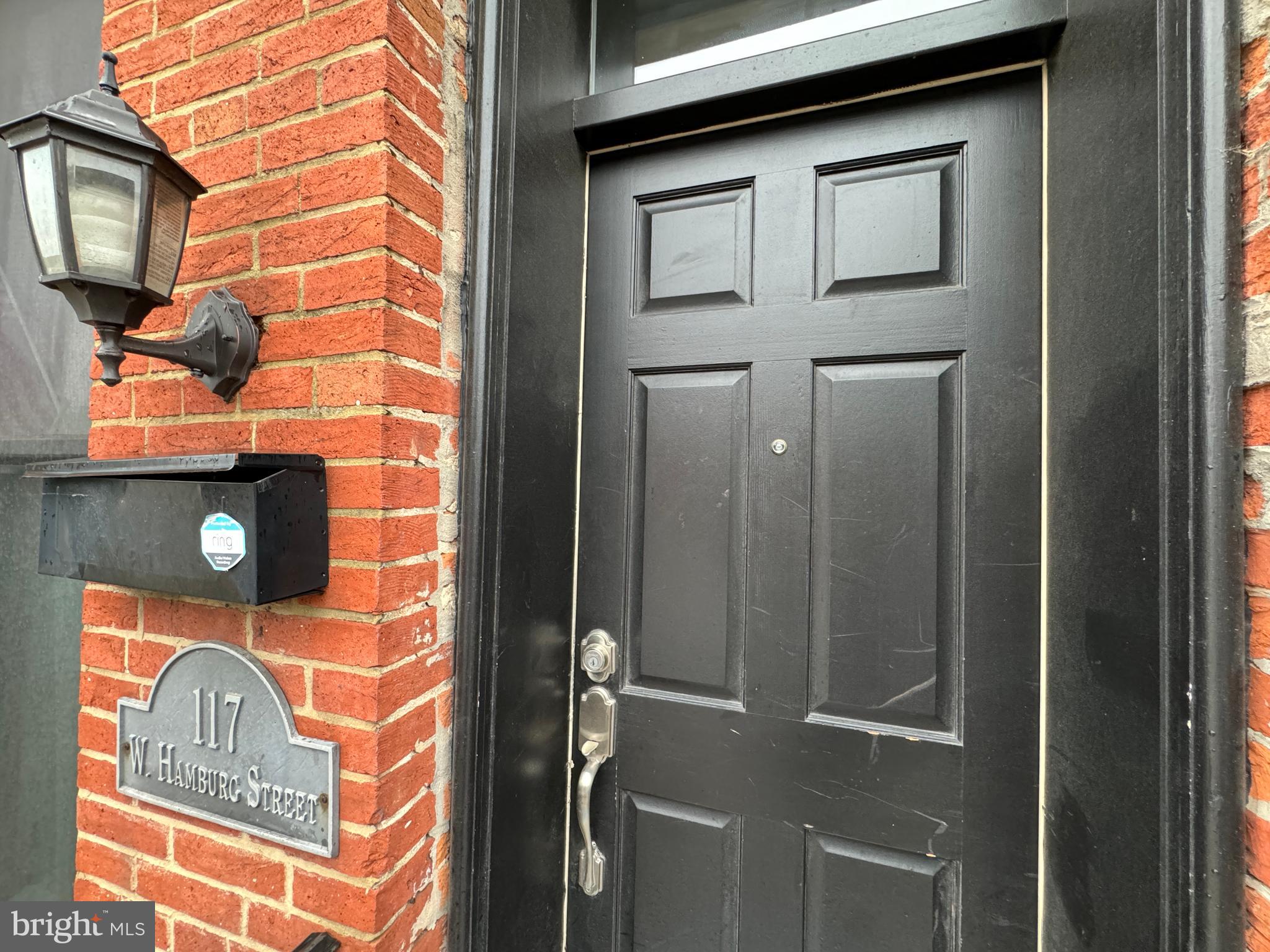 We've ran the numbers! This is the BEST bang for your buck in 21230 - Completely rebuilt using  CHAP parameters, the square footage is NOW about 2780 - Space. Parking. Stadium views. Walkability. Welcome to 117 W Hamburg St - an exceptionally rare Federal Hill opportunity offering approximately 2,700 square feet of living space, 4 bedrooms, 3.5 baths, 2 bonus rooms ideal for offices, guest space, gym, or additional living areas, and off-street parking for up to 6 vehicles - all situated on a rare oversized lot for Federal Hill living. This expansive brick townhome blends character, flexibility, and convenience with hardwood flooring, exposed brick, custom wood trim, pocket and barn doors, vaulted ceilings, abundant natural light, dual-zone HVAC and a spacious layout designed for modern living. The kitchen features stainless steel appliances, quartz countertops, and modern upgrades while maintaining tons of charm, and flows seamlessly into multiple living and entertaining spaces. Retreat to the rooftop deck with sweeping stadium views or enjoy the rare oversized private rear yard/parking area - perfect for entertaining, pets, play, or future possibilities. The expansive rear area may offer potential for a future garage or additional improvements. Additional highlights include lead-free certification and a strong history as a well-performing rental property, offering flexibility for owner-occupants and investors alike. Located just 2 blocks from Cross Street Market and moments from Ravens Stadium, Camden Yards, the Inner Harbor, restaurants, nightlife, and everything Federal Hill has to offer.