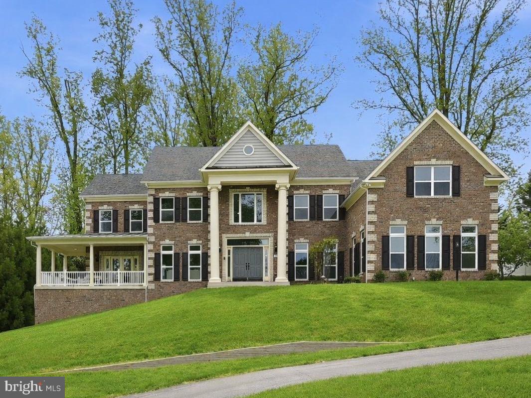 Like-new semi-custom home on a quiet cul-de-sac in McLean, filled with natural light and thoughtfully designed with an open floor plan, generously scaled rooms, abundant storage, and high-end finishes. The layout strikes a comfortable balance between formal entertaining spaces and everyday living.
The two-story foyer creates a welcoming first impression, flanked by well-proportioned living and dining rooms. The main level includes a private bedroom with an ensuite bath, ideal for guests or multigenerational living, and a sunroom that opens to the front porch. The kitchen features two large islands with seating, a walk-in pantry, and space for casual dining, and flows into the light-filled two-story family room with gas fireplace.
Upstairs, the primary suite offers a spacious retreat with a sitting area, oversized walk-in closet, and a well-appointed bath with a soaking tub and separate shower. Four additional bedrooms, each with an ensuite bath, are thoughtfully arranged on this floor, along with a conveniently located laundry room.
The walk-out lower level extends the living space with a large recreation area, wet bar, gym or bonus room, and a dedicated theater. A seventh bedroom with an ensuite bath and walk-in closet adds flexibility.
Situated on just over a half-acre lot, the property offers generous outdoor space with plenty of opportunity to customize. Expertly designed for comfort and convenience, the home includes an oversized three-car garage, EV charging, and a whole-house generator. Ideally located near Tysons, downtown McLean, top-rated schools, shopping, and dining, placing the best of McLean living within easy reach.
