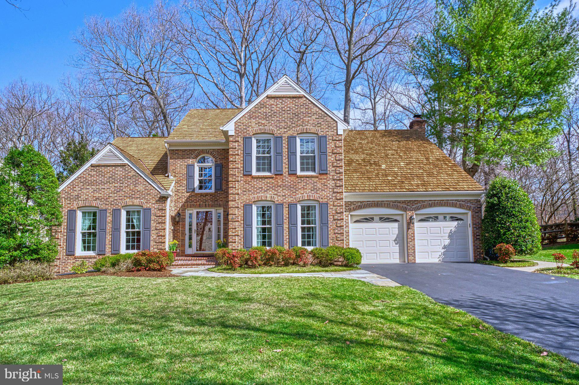 Wonderful upgraded stunning colonial in beautiful Franklin Oaks!!!  Nestled on a tranquil lot backing to parkland, this lovingly maintained home has an open floorplan that includes two-story ceilings, vaulted ceilings and lots of crown molding.   There are hardwood floors throughout the main level with built-ins, recessed lighting and newer windows.  The living room is filled with light and opens to a large dining room with a box window overlooking trees.   The gourmet kitchen has been remodeled with newer cabinetry, granite, under-cabinet lighting, glass doors and a large island with bar stool seating.   There are stainless steel GE and Whirlpool appliances including a five-burner gas cooktop, a side-by-side refrigerator with ice dispenser, and double ovens.  The kitchen overlooks the breakfast area and the terrific family room with a raised-hearth, brick, wood-burning fireplace.  There is built-in shelving on either side of the fireplace, recessed lighting and access to the large fun deck and patio in the private rear yard.    Also on this level is the versatile fifth bedroom that has access to the fourth full bath.  The bedroom currently makes a great sunny office.   The gracious entry foyer with a wooden bent staircase leads to the upper primary suite with a sumptuous remodeled bath with a deep soaking tub, a designer-tiled shower with frameless glass, and dual sinks.   WOW!!!  All four of the upstairs bedrooms have great windows, large closets, brand new carpeting and ceiling fans.   The awesome lower level has a large recreation area with a gas fireplace, built-in TV area, shelving, recessed lights and a game table area.   There is also a pool table with a ping pong conversion top and a wet bar with barstool seating.  It has a full size refrigerator and pendant lighting.   There is an exercise room / guest area with access to a newer full bath.  There is an extensive storage area, along with the high-efficiency gas furnace and the brand new gas hot water heater.   You will love the welcoming rear yard with the large deck and paver patio overlooking the treed parkland.   Your guests can be greeted via the slate sidewalk and brick front porch or there is a terrific paver sidewalk from the front around to the back.   This home has been almost completely updated throughout so that the new owners can move-in and relax!!!  Even the garage flooring has been freshly painted and the 30-year wood shake roof has about another ten years of beautiful life!   The sought-after Franklin Oaks community, with its large central pond and walking paths, is located near major employment centers like Tyson's Corner, Fair Lakes and the entire Dulles Technology corridor.   It is convenient to the Fairfax County Parkway, Route 50, I-66 and the Dulles Access Road.    Enjoy all that the nearby Reston Town Center offers!!!  The home is served by the GREAT Fairfax County schools in the Oakton High School Pyramid.