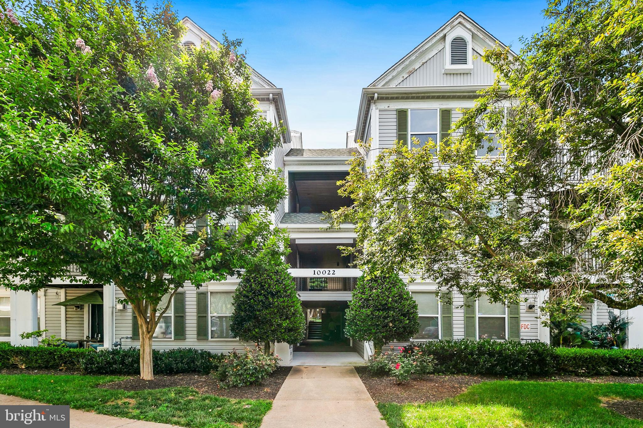 Welcome Home!
This top-floor, 1,500 sq ft home overlooks the community tennis courts. It has been meticulously maintained and recently refreshed with new interior paint. With beautiful vaulted ceilings and a warm fireplace, it features two spacious, bright bedrooms (one with a walk-in closet), each with its own updated bathroom, plus three skylights that bring in abundant natural light. A galley kitchen with granite countertops, backsplash and a stacked washer/dryer support everyday convenience, while an open spiral staircase leads to a loft with its own closet—ideal for a home office, additional living space, or guest area. Enjoy a private balcony with open-air views for morning coffee or al fresco dining. Condo fees conveniently include water, and the unit conveys with one assigned parking space (#101). *** Recently inspected. Newer HVAC (2022-2023) and tankless water heater (2014). *** Ideally located for convenience, this home offers proximity to NIST, Shady Grove Metro, and the local hospital, with easy access to Downtown Crown, Rio, I-270, and ICC-200.  Hurry and claim this hidden gem at a can't-beat price!