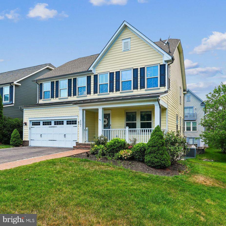 RARE cul-de-sac location with open green space,  WALKOUT basement, and TWO outdoor entertaining areas in sought-after Potomac Shores! This inviting home sits handsomely at the end of a  cul-de-sac and boasts over 3600 square feet of finished living space. From the welcoming front porch to the light-filled open floor plan, every space has been thoughtfully designed for everyday comforts and entertaining.  Wood floors flow throughout the main level, from the home office/study, into the family room w/gas fireplace, and to the kitchen.  Everyone will gather 'round the center island to enjoy meals prepared in this perfectly polished kitchen!  Upstairs, the expansive primary suite is fit with a luxurious en-suite bath and an impressive customized walk-in closet. Three additional generously sized bedrooms, a full hall bath, and an upper-level laundry room provide comfort and convenience for today's lifestyle.
The fully finished walkout basement expands your living space with a large recreation room, separate media/flex room (perfect for a home gym or theatre), full bathroom, and lots additional storage.
A rare find is two outdoor entertaining spaces! Off the kitchen is an elevated rear deck and from the lower level rec room, step out to the custom patio. This is the home that invites you in, leads you to stay, and before you know it, you're home!

Located in the award-winning Potomac Shores community, residents enjoy exceptional amenities including high-speed internet, multiple pools, fitness center, community clubhouse, scenic walking and biking trails, playgrounds, social events, and access to the Jack Nicklaus Signature Golf Course. Conveniently located near I-95, commuter routes, the future VRE station, shopping, dining, and waterfront recreation, this home offers the lifestyle you've been waiting for.

A rare opportunity to own a beautifully maintained home in a premium cul-de-sac location with exceptional outdoor living spaces—schedule your private tour today!