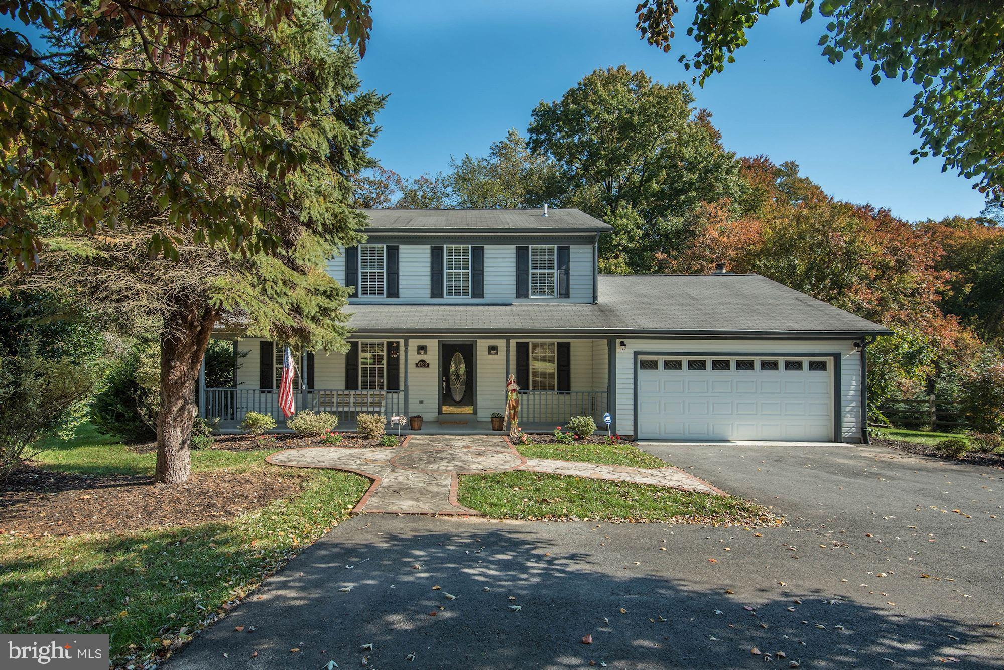 Charming 4 bdrm 3.5 bath colonial beautifully sited on a private 3/4 acre lot. Hardwood floors throughout the main level compliment the updated gourmet kitchen, large living rm, cozy family rm and year round sunrm. Three well proportioned secondary rooms & a great master suite w/ spa like bath complete the upper level. Large Rec Room & full bath make the lower level perfect for entertaining.