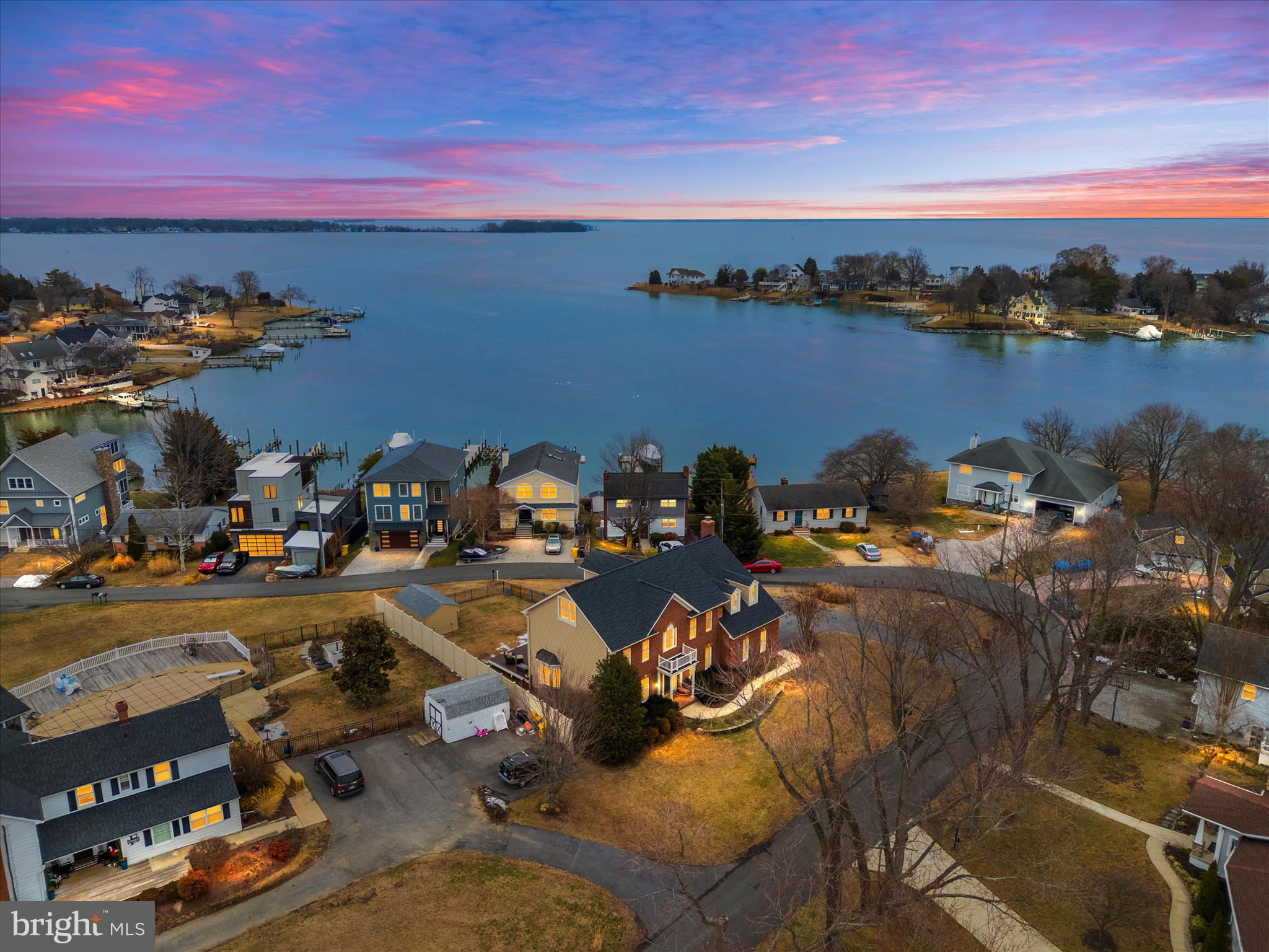 Welcome to your own coastal escape on coveted Parke Drive in the water-privileged community of Turkey Point Island flanked by Ramsey and Selby Bays. Just steps from the South River, this thoughtfully maintained home invites you to embrace island living with peace of mind, featuring major upgrades already completed, including a new roof and water heater - much more.

Inside, you’ll find a warm, light-filled layout that flows easily from the kitchen and dining area to comfortable gathering spaces—perfect for everyday living or hosting friends after a day on the water. Plenty of bedrooms (5) and full baths (5) provide everyone with their own oasis, and the 3rd floor is ideal for a home office with water views of the Bay or a creative hobby room. Relax and recharge in your primary suite enjoying waterviews from all side - the bathroom, bedroom and sitting room. 

But the excitement doesn’t stop there! The fully finished recreation room with a built-in bar is ready for game nights and celebrations, while the dedicated workout room keeps your fitness routine close to home. There’s also an unfinished storage area with convenient walk-out stairs leading up to the backyard—making organization and access easy. Step outside to your large patio off the kitchen, perfect for grilling, entertaining, and soaking up the coastal atmosphere or a cup of coffee watching the sunrise over the water.  And don’t miss the spacious shed with electricity, providing the perfect workshop or storage space for all your water toys and tools.

Outside your door, you’re just moments from the community beaches, pier, and common areas where neighbors walk, kayak, crab, and watch the sunrise over the Bay. Turkey Point Island offers a rare combination of tranquility, natural beauty, and convenience—nestled on the Mayo Peninsula with easy access to Selby Bay Yacht Club, Turkey Point Marina & Yacht Club, Annapolis dining, shopping, and marinas, plus commuter routes to D.C. and Baltimore.

Whether you’re moving toward a simpler lifestyle, buying your first place near the water, or securing a weekend getaway, this home is your gateway to the Chesapeake Bay experience so many are seeking right now.  Your vivid sunrises and sunsets await your arrival.