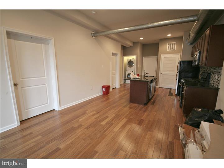 Available early July:  1509-11 W Girard Ave is a newly constructed building which is professionally managed by JG Real Estate, has resident-only parking available, an elevator and well-kept & cleaned common areas. You will be able to pay your rent/submit maintenance requests directly online, have a 24/7 emergency maintenance hotline, and receive professional and courteous service from the property management staff. There is garage parking available directly underneath the building for $50/month.  Unit #3 is located on the 1st floor of the building. It has two bedrooms and two full bathrooms, with a front loading washer/dryer in unit for added convenience. Finishes include hardwood floors throughout, high ceilings, spiral ductwork, stainless steel appliances, granite countertops and mosaic tile backsplash. One of the bathrooms is attached to one of the bedrooms, while the other one is off of the kitchen area.   Located just off of Broad & Girard, this building is extremely convenient to public transportation as you can walk a half block to the Broad Street Subway Line or to multiple trolley stops on Girard Ave. Close to Temple University, Fairmount/Art Museum areas.  First month, last month, one month security deposit due at lease signing. $65 move-in fee. $45 application fee per applicant. Pets are conditional on owner's approval and will require additional deposit, if accepted. Tenants responsible for electricity, gas, cable/Internet. Water is included in the rent.