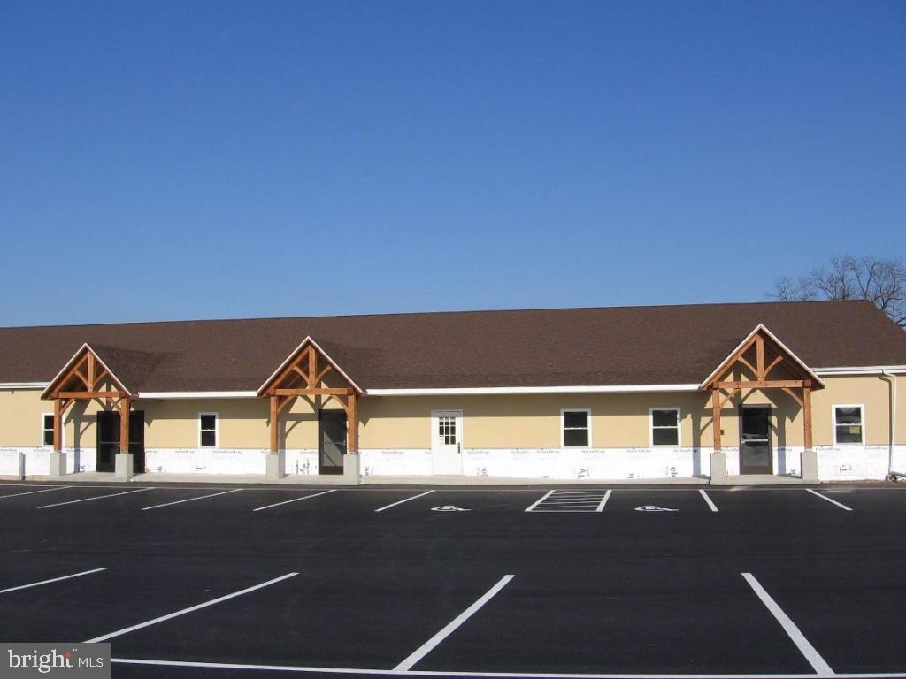 7 room office space with ample parking. Additional office space is available plus adjacent warehouse space is also available.