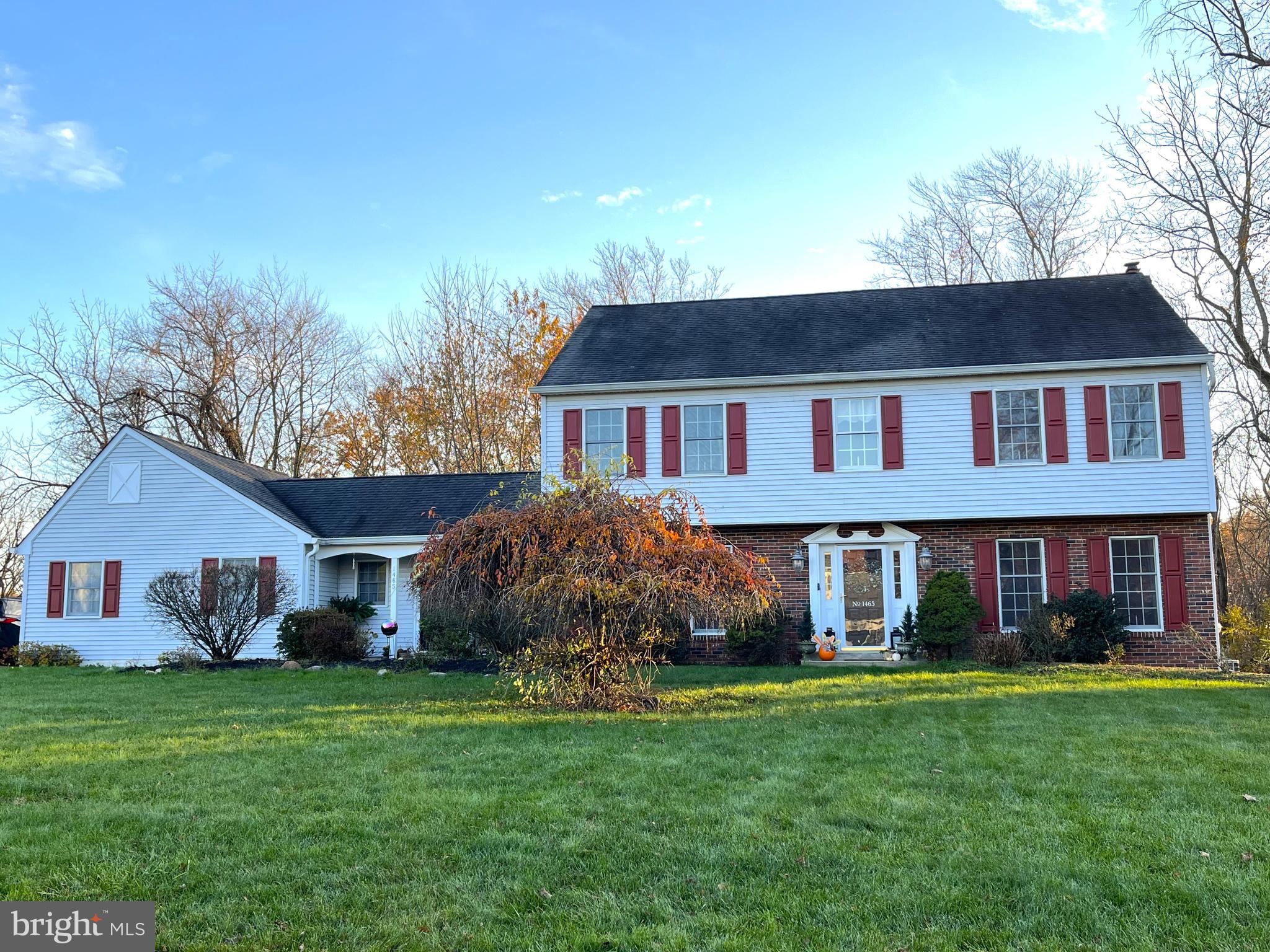 You'll love this beautiful neighborhood of Buck Hill Estates consisting of large private lots. This spacious home sits on just under an acre of ground and has a wonderful 3-tier decking system that over looks  it's own woods. The large, sunny eat-in kitchen w/island, SS appliances, granite counter tops, double oven, and pantry overlooks the Family room with a brick gas fireplace and built-in shelving - both with great views of the wooded rear yard. There is a 1st floor bonus room with cathedral ceilings that could be an office, playroom/mudroom or craft area. The 2 story foyer leads to a formal dining room and living room. Upstairs  is a large master with walk in closet, dressing area and bath with whirlpool tub and separate shower plus 3 other bedrooms and hall bath.The walkout basement has an open concept design with a kitchenette/snack counter with sink, 2nd family room, private office, powder room and lots of storage that could easily be converted to an in-law situation. Other features include: Wood flooring in the foyer, Family room, kitchen, DR, LR and 2nd bedroom;  remodeled powder room with vessel sink; crown, chair and picture molding;  electric induction cook top; laundry with utility sink; new rear steps;  recessed and eyeball lighting 2.5 side entrance garage; 2 bay windows and an oversized sliding door from the family room to the deck and gutters guards. A great home for relaxing and entertaining!