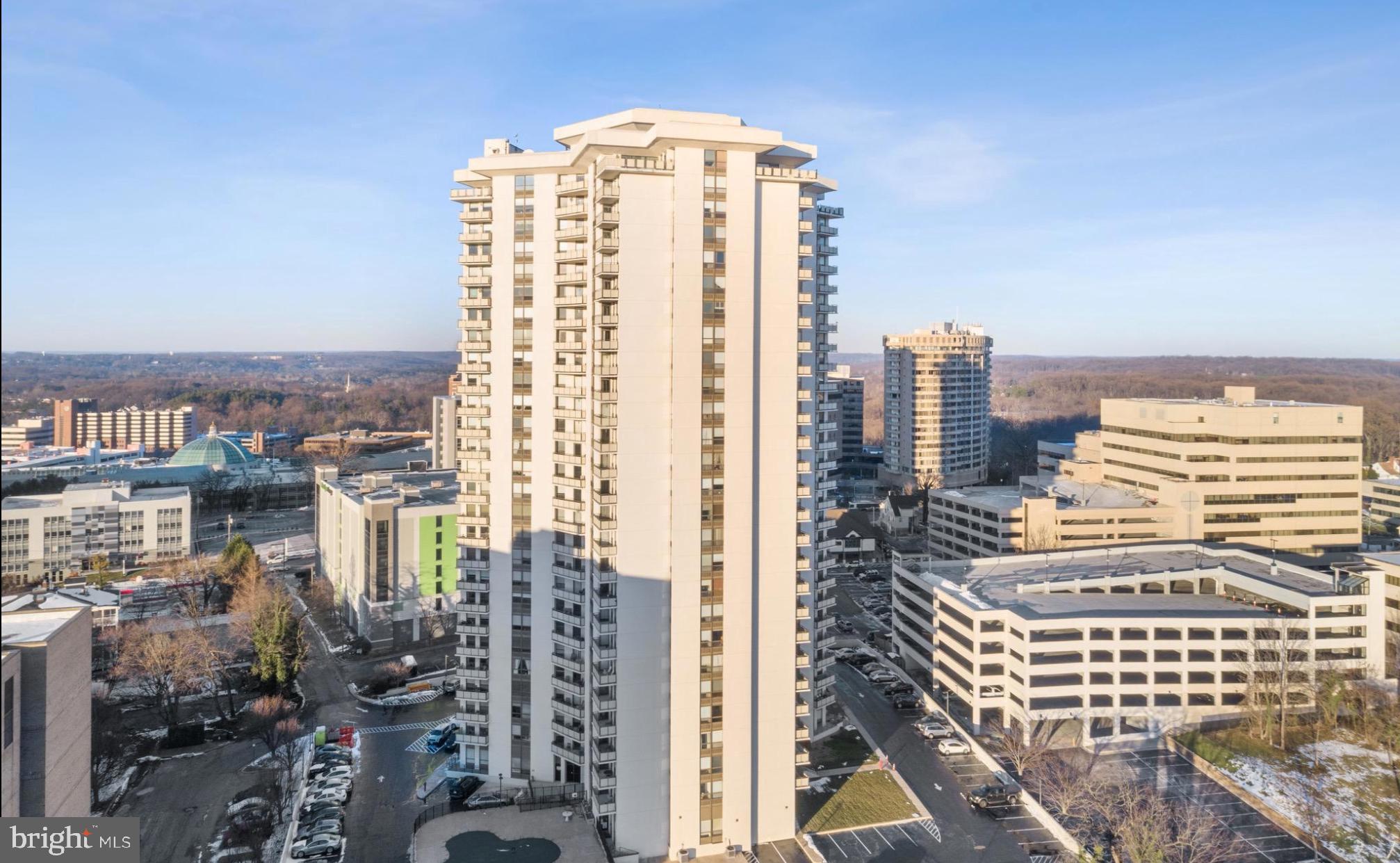 EXTREME VALUE IN AMENITY RICH BUILDING*** 2 DEEDED PARKING SPACES*** INCREDIBLE VIEWS!

Welcome to the Ridgely, where high-rise living is stylish, stress-free, affordable and conveniently located just minutes from the Towson circle, Towson University and the Towson Town Center. This stunning 1,402 sq ft corner unit has 2 bedrooms and 2 full bathrooms, engineered blonde hardwood floors, and a gourmet kitchen with a glass tile backsplash. The open-concept living and dining areas flow seamlessly onto the private balcony, offering breathtaking views stretching to the Port of Baltimore. The building-maintained HVAC system and a condo fee that includes electricity, heating, and cooling make for worry-free living.  Additional amenities include: • Two deeded individual parking spaces in the secure garage • Access to a heated saltwater pool on the premises • In-unit washer and dryer. This home high in the sky is freshly painted with  updated bathrooms and deep-cleaned from top to bottom. This move-in-ready condo won’t last long! Schedule your showing today and make it yours.