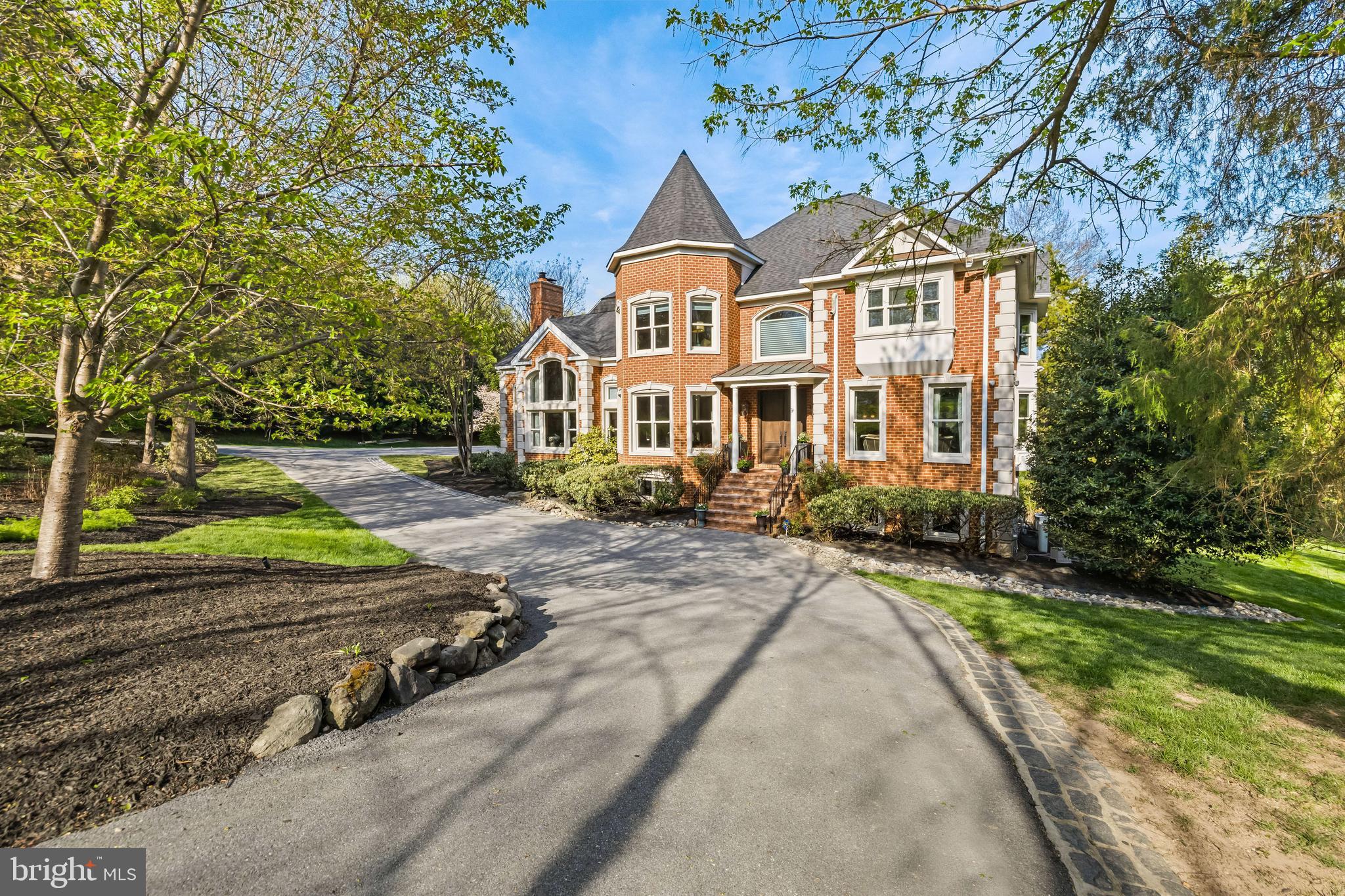 Welcome to this custom-built, estate-style residence located in the prestigious Forest Glen community of Howard County. Renovated from top to bottom between 2020 and 2025, this 5-bedroom, 4 full and 2 half-bath home offers a seamless blend of timeless elegance and modern luxury, with no detail overlooked. Step inside to wide-plank, sand-in-place French white oak floors that run throughout the main level, setting the tone for the home’s sophisticated finishes. A brand-new designer lighting package complements the updated Lutron lighting system, creating a warm, refined ambiance in every room. The grand great room is the true heart of the home, featuring soaring vaulted ceilings with exposed beams that frame the space with architectural drama and natural charm. The room flows effortlessly into the fully renovated gourmet kitchen, outfitted with a leathered granite waterfall island, a Wolf 6-burner gas range with integrated griddle and grill, three Wolf ovens, a warming drawer, a Miele coffee maker, a microwave, a Thermador dishwasher, and Sub-Zero refrigeration including a full-size side-by-side unit, wine cooler, and additional reach-in refrigerator. 

Throughout the home, Marvin windows and doors bring in abundant natural light, while all bathrooms have been stylishly updated with Kohler fixtures and designer tile. Subtle yet elegant technique wall finishes elevate the primary bedroom, powder room, and home office with soft neutral tones. A Sonos sound system on the main and lower levels, along with a hardwired ADT security system featuring 12 exterior cameras and a dedicated surveillance screen, add to the home’s functionality and peace of mind. The fully finished lower level offers even more living space with a custom bar featuring natural stone tile, granite countertops, a beverage fridge, and dishwasher. This level also includes a media room, fifth bedroom, full bath, and a spacious bonus room perfect for arts and crafts or hobbies. 

Outside, the home is wrapped in four-sided brick construction and topped with a brand-new architectural shingle roof and gutters (2025). Additionally, a screened-in gazebo with a wrap-around deck, ideal for entertaining or relaxing while overlooking the beautifully landscaped grounds and tranquil koi pond with waterfall features. The property also includes a three-car garage and a separate golfer’s garage, offering ample space for storage and recreation. This extraordinary home offers a rare opportunity to enjoy refined living in one of the area's most sought-after neighborhoods.
