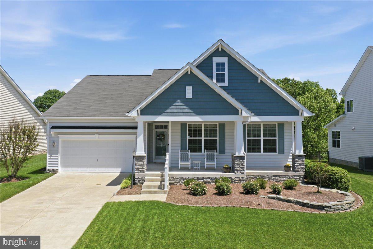 Welcome home to this beautifully maintained rambler offering thoughtful upgrades, spacious living areas, and an inviting open floor plan. Stunning landscaping and a charming front porch create exceptional curb appeal and welcome you into a spacious foyer that flows seamlessly into the main living spaces.
The formal dining room is accented by decorative columns, while the living room features a cozy fireplace, perfect for relaxing evenings. Beautiful Canadian hardwood flooring extends throughout the foyer, dining room, living room, and office.
 A chef’s kitchen is designed to impress with abundant cabinetry, soft-close cabinets and drawers, granite countertops, a center island, stainless steel appliances, and a convenient hot water dispenser at the kitchen sink.
Retreat to the expansive primary suite featuring a walk-in closet and a luxurious en-suite bath complete with dual vanities, a soaking tub, and a separate shower. Two additional generously sized bedrooms share an updated hall bathroom. A main-level laundry room adds everyday convenience.
A finished basement offers a large den or recreation room, a full bathroom, and ample storage space, providing flexibility for a variety of needs.
Step outside to enjoy the fenced backyard and covered 20’ x 22’ porch with stairs, ideal for entertaining, outdoor dining, or simply unwinding.
Conveniently located in a quiet neighborhood with easy access to Front Royal Pike and I-81, this exceptional home combines comfort, style, and convenience in a desirable setting.