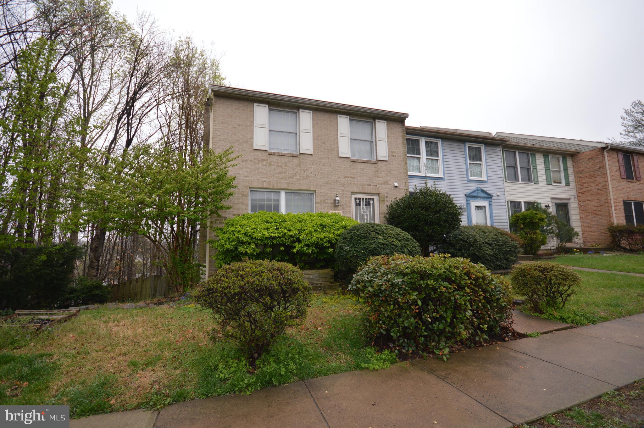 The photos are from a previous listing of the property. Beautifully maintained and move-in ready, this stunning 3-level end-unit brick-front townhouse features 3 bedrooms and 3.5 bathrooms. Hardwood floors adorn both the main and upper levels. The primary suite includes a full bath and walk-in closet. The spacious walkout basement offers a cozy wood-burning fireplace and a full bath. Enjoy a separate dining room and an upgraded kitchen, along with a large deck off the dining area and a charming patio. The fenced backyard backs to serene woods. Conveniently located near I-95, commuter lots, Quantico, restaurants, and shopping.