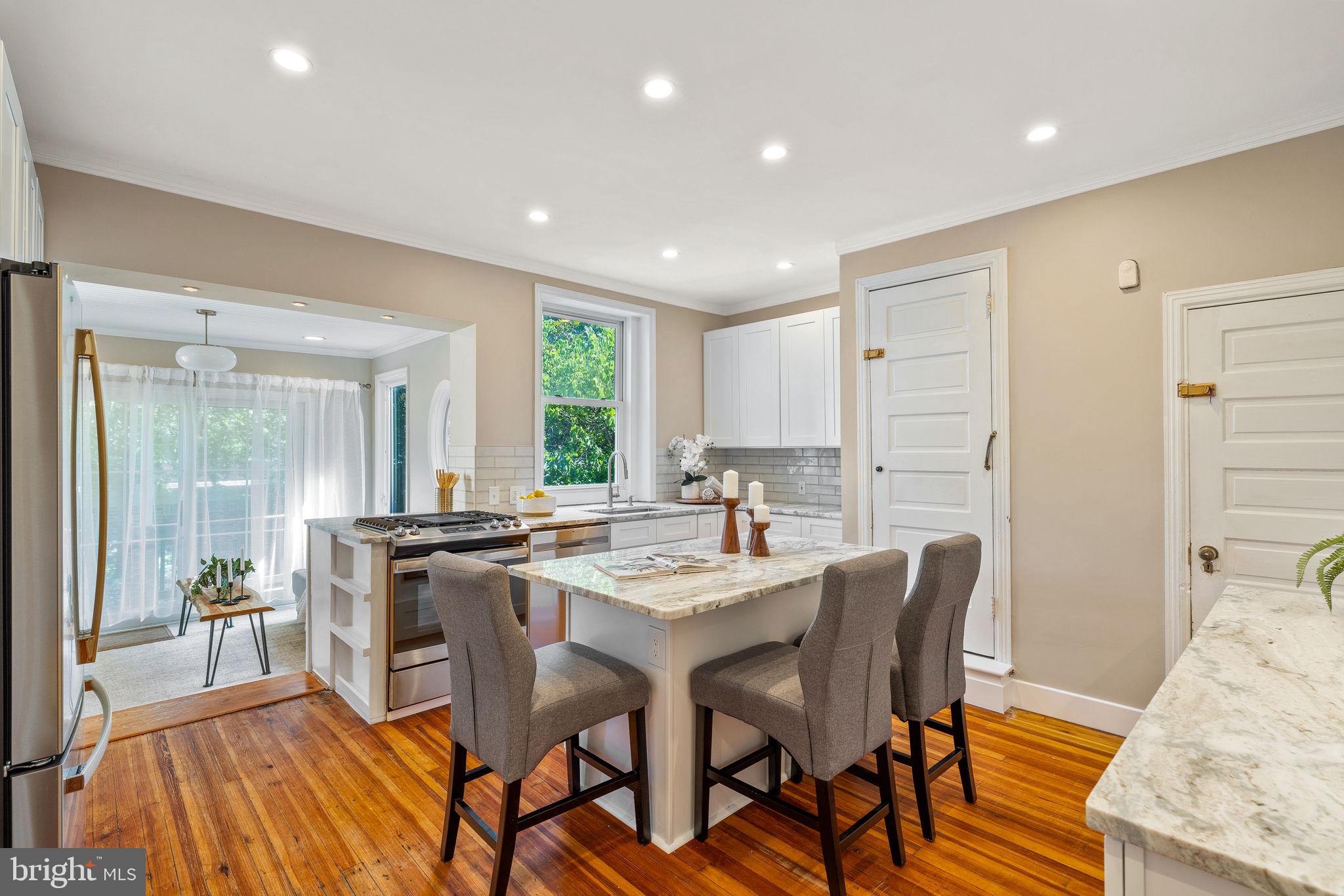4215 Pine Street is the one you’ve been waiting for. Located in the highly sought after Penn Alexander School catchment, this home features more than 4000 sq ft of move-in ready living space that’s the perfect blend of preserved historic character with modern amenities: two car detached garage parking; 7 bedrooms & 2.5 baths; 3 fireplaces; a brand new kitchen and newly renovated bathrooms; formal dining room and three distinct living/entertaining spaces (on the main floor, on the second floor, and in the basement); second floor Primary Suite with an adjacent brand new Changing Room & upstairs laundry machines; 4 more bedrooms with a brand new bathroom on the third floor; fully finished walkout basement with a wet bar & finished storage room; 4 private outdoor spaces (a beautiful courtyard, an elevated garden on top of the detached two-car garage, and two covered porches in the front and back of the home); an additional approx 1000 sq ft of attic storage; secondary stairwell that can be modified to add more storage or to install an elevator; a gorgeous Sunroom with heated floors adjacent to the kitchen; dual zoned HVAC, upgraded electric… and all of this is situated on a beautiful and quiet tree-lined block in the heart of Spruce Hill. Just steps from CHOP, University City, the University of Pennsylvania and Drexel, Clark Park, Green Line Cafe, and the shops & restaurants along Baltimore Avenue, homes this nice and this big in this neighborhood don’t come around too often.  Schedule your showing today.