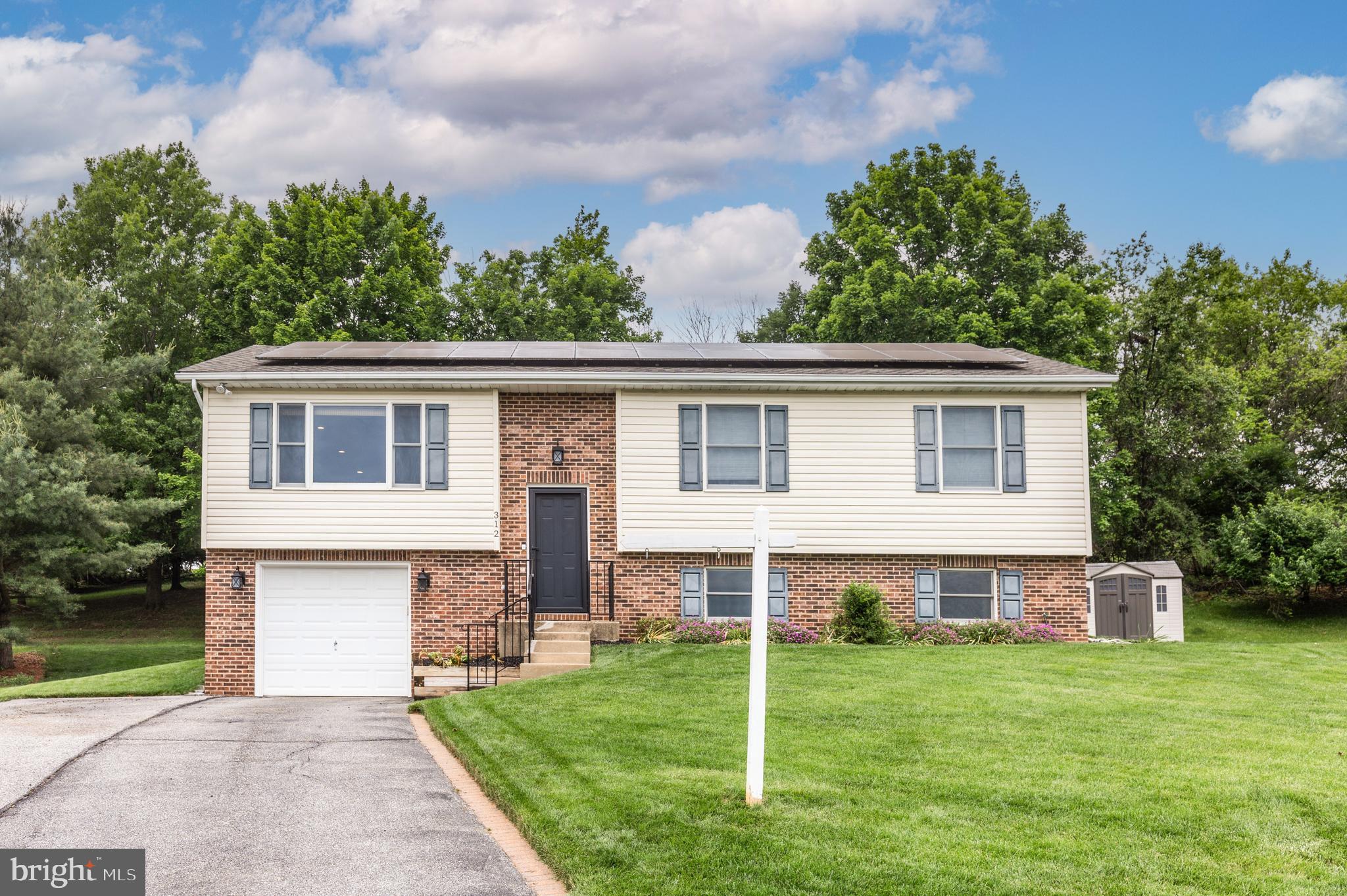 OPEN HOUSE: Saturday, 6/20, 11am-1pm
Renovated Westminster split foyer backing to open green space in a quiet, established neighborhood. The main level impresses immediately, open-concept kitchen with granite island, stainless appliances, and a four seasons room with vaulted ceilings that buyers consistently call the heart of the home. Primary suite with private en-suite bath and generous closet space.

Finished lower level offers a large rec room, office nook, half bath, laundry room, and walk-in storage. Garage with keypad entry and workshop space. Expanded driveway. Trex deck overlooks a private, immaculate backyard with serene views backing to Carroll Lutheran Village near Wakefield Valley walking trails.

Owned solar panels mean real monthly savings with no lease and no transfer, energy bills that actually make sense. Low-maintenance inside and out. Minutes to Westminster shopping, dining, McDaniel College, and major commuter routes. Easy access throughout Carroll County. Move-in ready. Energy efficient. Privately situated. This one delivers.