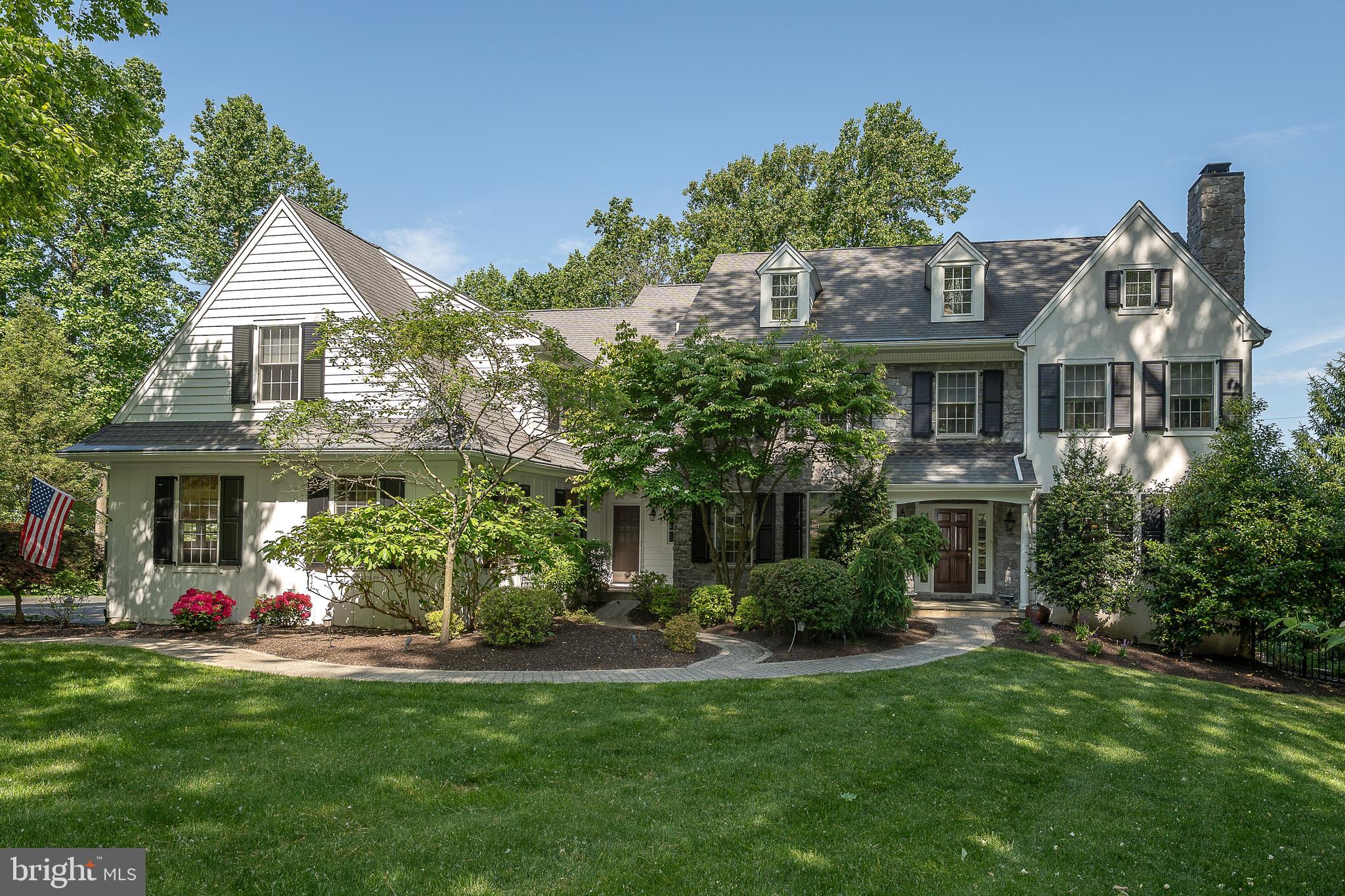 Nestled on a quiet, wooded, professionally landscaped property, 385 Bodine Road is a classic Ann Capron designed center hall colonial, offering 6 bedrooms, 4 baths with fabulous walk-out lower level. Front to back entrance features graceful, curved staircase highlighting the superior finishes of builder Kurt Wolter. A generously sized dining room invites entertaining, while fireside living room opens to private corner study with glass doors providing a quiet retreat. Stylish kitchen featuring a Bosch cooktop, wine cooler, new refrigerator, new double oven and separate coffee bar flows into the most warm and comfortable family room.  Beamed ceiling, lovely stone fireplace and large window of natural light provides a comfortable space for family gatherings. The new sliding door offers access to a large Timbertech deck with entertaining space while the fabulous screened porch is a perfect spot to enjoy peaceful morning coffee. The extra large (840 sq feet) 3 car garage is a dream!  Epoxy floor, high ceiling with bike lift, utility tub and total wall of convenient built-in cabinets for organized storage including a butcher block style 15 foot workbench.  Best I've ever seen!  Charming main stairway lead to splendid primary suite with sitting room, double walk-in closets and lovely bright bathroom with whirlpool tub and double vanities.  Another bedroom is ensuite, while the others share a jack and jill hall bath. The lower level is amazing!  There is a full wall of windows offering an abundance of natural light, the 6th bedroom with spacious custom closet and full modern bath, separate gym with mirrored walls and rubber elephant bark flooring, granite kitchen/bar with under cabinet lighting, dishwasher, ice maker and bar sized refrigerator, comfortable area for viewing your favorite movie with surround sound, pool table, sitting wall, darts and wine tasting table.  Wait until you hear the whole house indoor/outdoor sound system with speakers in the family room, office, porch, lower level and pool area.  Outside is impressive!  Enjoy the fire pit and relaxing heated swim spa ringed in Asian sand stone surrounded by in ground natural gas Tiki torches. Imagine yourself on a warm evening when the torches are lit, pool is bubbling with colored lights, and music is playing…..it's magical!!  Enjoy the luxury of nearby TE schools, shopping and transportation including the airport. This lovingly cared for exceptional home is a rare combination of gracious living with a fun, pub style lower level.  You will love living here!!
