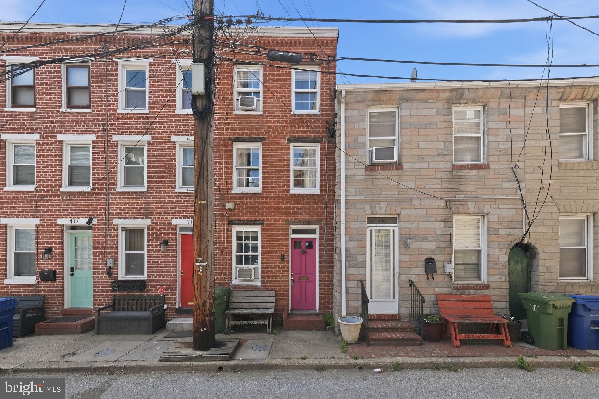 Tucked along a charming cobblestone block in the heart of Fell's Point, this quirky 2-bedroom, 2-bath historic row home is filled with warmth, character, and natural light. Large windows brighten every level, highlighting beautiful hardwood floors, inviting living spaces, and thoughtful details throughout. The kitchen offers everyday ease with modern conveniences, while the flexible two-bedroom, two-bath layout makes room for guests, a home office, or easy city living with space to spread out. Out back, a private fenced courtyard creates a tucked-away outdoor retreat—ideal for morning coffee, container gardening, or evenings under the stars. Built in the late 1800s and full of classic Baltimore charm, the home sits just a short walk from the waterfront, neighborhood cafés, restaurants, and the center of Fell’s Point. Historic, sunny, and full of personality—this is quintessential Fell’s Point living with a little extra soul.
