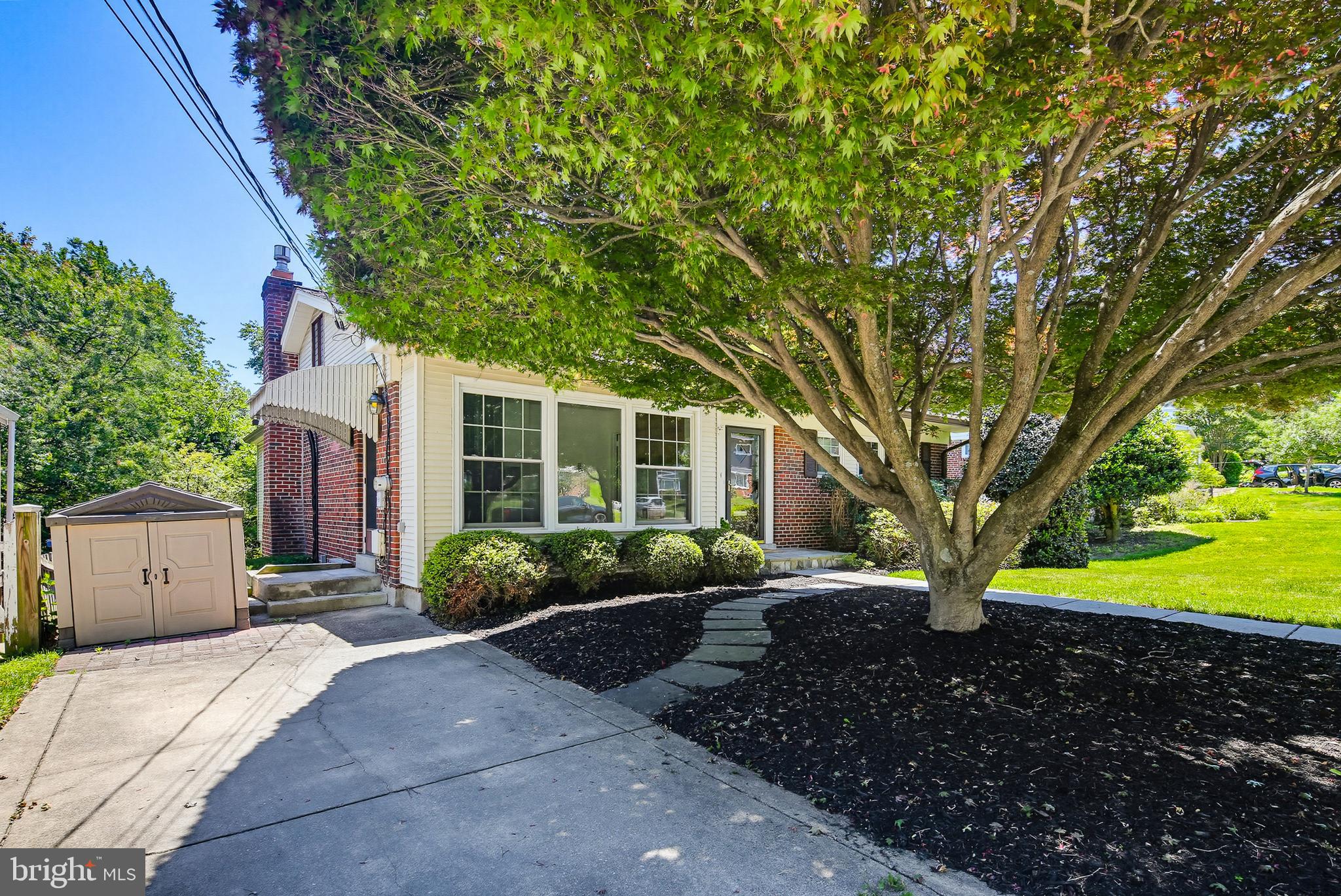 Welcome to the highly sought-after Woodmoor neighborhood, where this lovingly maintained home has been cared for by the same owners for more than 50 years. Full of warmth, space, and natural light, this move-in ready property offers incredible flexibility and timeless charm.
The main level features two spacious bedrooms, each with its own attached bath, plus an additional full hall bath — offering the convenience of 3 full baths on one level. Originally designed as a 3-bedroom layout, one wall was removed to create an oversized bedroom and could easily be converted back if desired. The sun-filled eat-in kitchen offers abundant natural light, while the adjoining dining and living areas flow into an expansive family room addition complete with a gas fireplace, walls of windows, and beautiful backyard views.
The walkout lower level feels bright and welcoming with full-sized windows, a second large family room with gas fireplace, an additional bedroom, full bath, and an unbelievable amount of storage space. Outside, enjoy a level fully fenced backyard with a patio, deck, and large shed — perfect for entertaining, gardening, or relaxing.
Fresh paint throughout, beautifully maintained wood floors, some new carpeting, a roof just 1.5 years old, and major systems replaced within the last 6 years make this home truly move-in ready while still offering opportunities to update at your own pace.
Ideally located with easy access to commuter routes, shopping, restaurants, schools, and the beloved neighborhood bakery, this is a rare opportunity to own a meticulously cared-for home in one of the area's most desirable neighborhoods.
