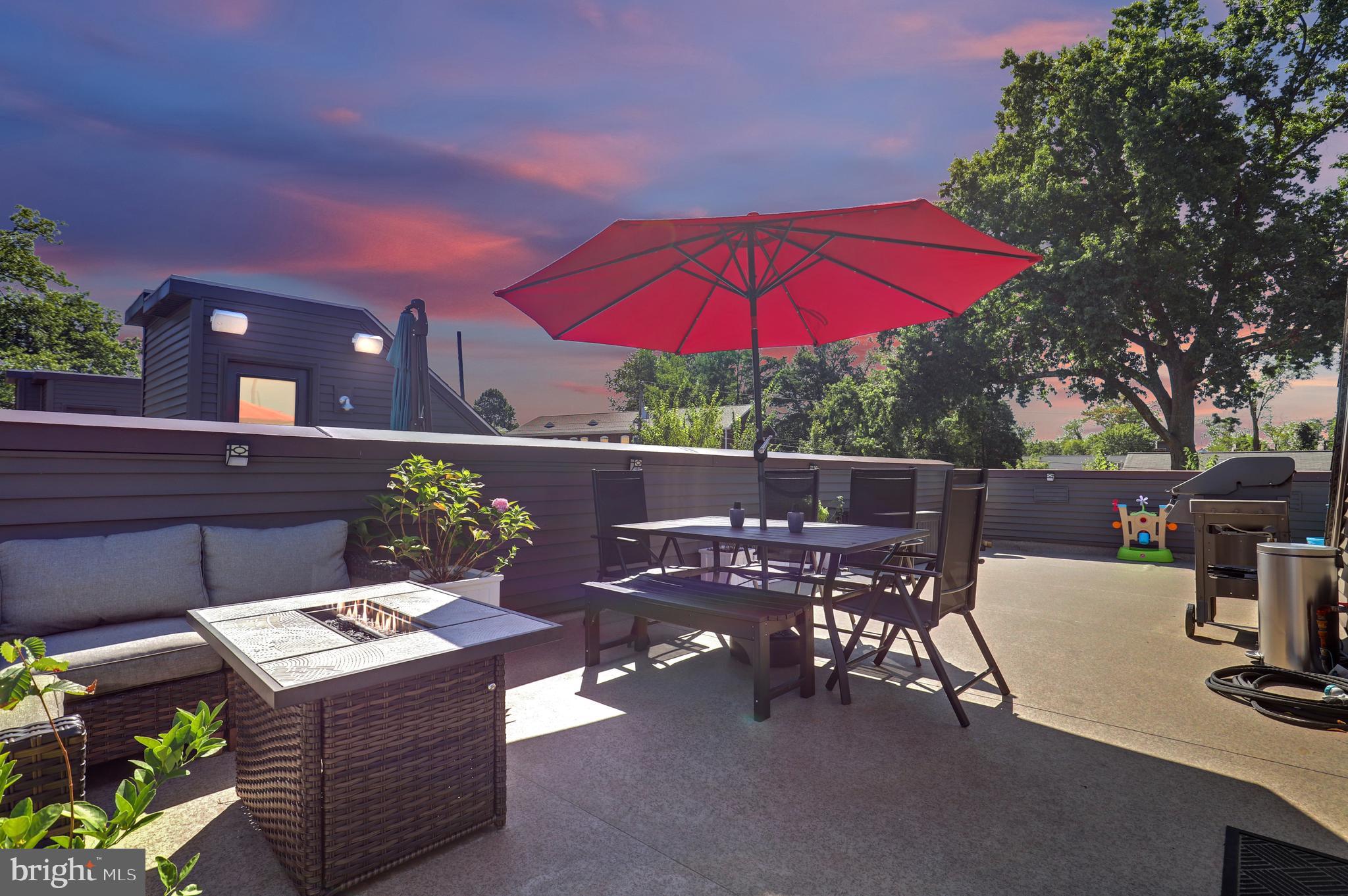 ***NEW PRICE***
Welcome to your dream home at 5701 11th St N #5 in Arlington! This stunning townhome is a perfect blend of modern style and comfortable living. As you enter, you'll be greeted by the warm and inviting main level featuring beautiful hardwood floors. The open floor plan creates a spacious and connected living space. The gourmet kitchen boasts a large island with ample bar seating, stainless steel appliances, subway tile backsplash, sleek marble countertops, a wall oven and cooktop adding an extra layer of convenience to create a remarkable functional space! Natural light fills every corner of this townhome, creating a bright atmosphere throughout the day. There are two spacious bedrooms on the upper level with the primary suite featuring a double vanity, stand-up shower with floor-to-ceiling tile, and high-end finishes. Downstairs you will find an additional bedroom with a full bath. If you enjoy spending time outside, the real star of the show is the extra spacious rooftop deck with beautiful views of the surrounding parkland and ample space for guests (the roof also features an already-installed gas line for your grill).  The home also boasts a 2-car garage with plentiful street parking for guests.  This community is active and typically hosts multiple activities throughout the year for enjoyment. This property is conveniently situated less than a block from Westover Park, with baseball fields, volleyball, basketball courts, and a playground.  Beautiful Bon Air Park, with additional playgrounds, picnic shelters, endless green space, a bucolic creek, access to the Four Mile Run and W&OD Trails and a bike path is nearby.  The home is also a .08-mile distance to the Westover Town Center with shopping and beloved local restaurants like The Italian Store, Lost Dog Café, Lebanese Taverna, and the Westover Beer Garden & Market.  Commuting is a breeze with quick access to I-66, making your daily travels more convenient, roughly 1.5 miles to TWO Metro stations – East Falls Church and Ballston-MU with direct access to the Orange and Silver lines. Close proximity to DC, Pentagon, Virginia Center Hospital. Easy access to shopping, dining and exciting nightlife in nearby Ballston, Courthouse and Clarendon neighborhoods. This home offers a lifestyle of luxury, comfort, and convenience in the heart of Arlington. Don't miss the chance to make this exceptional property your new home!