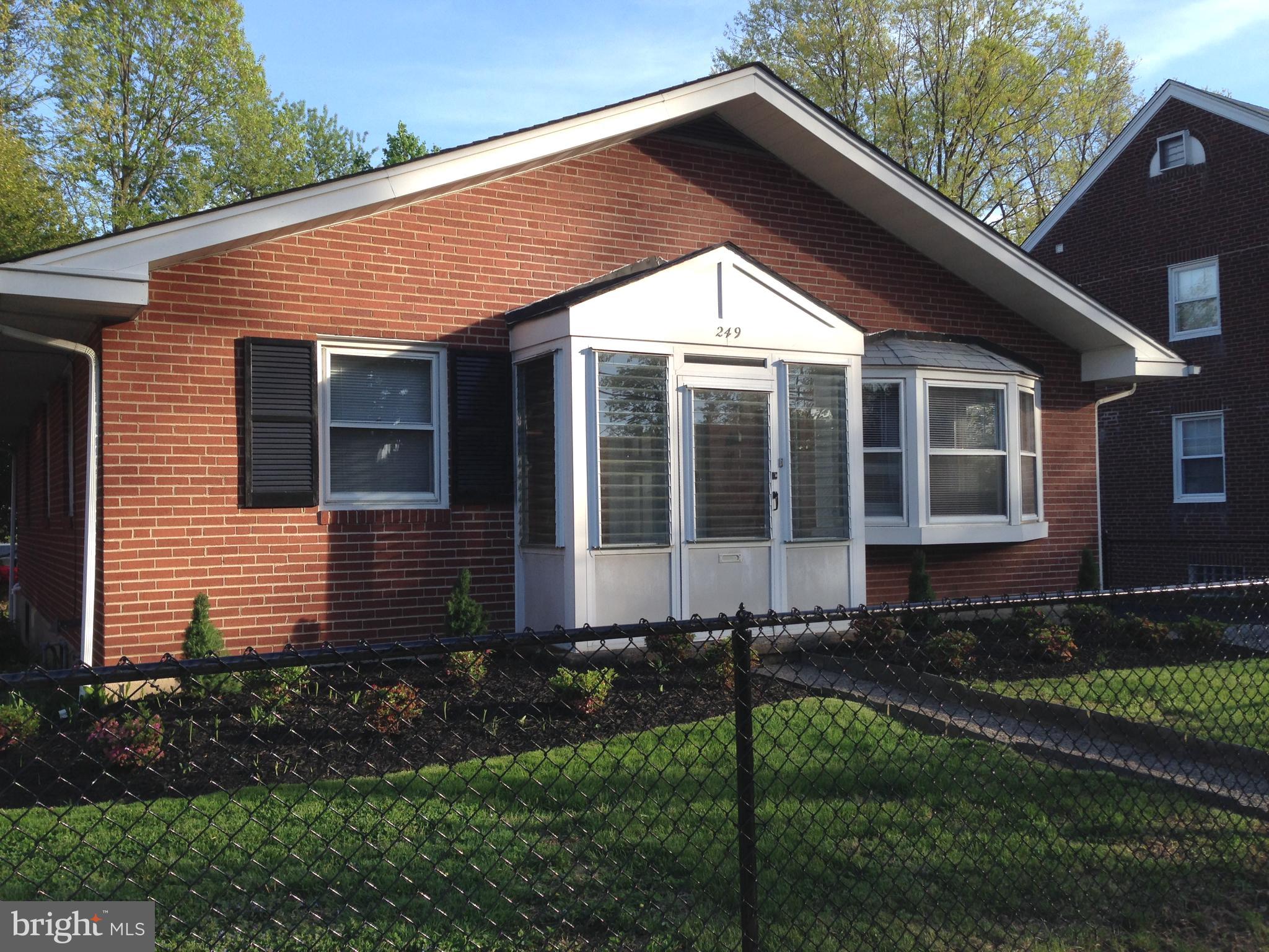 Adorable brick ranch located on a quiet street in the heart of Havertown, This three bedroom one bath home features an open floor plan, newer kitchen (2016), updated bath, gleaming hardwood floors,  gas heat, central A/C and a beautiful back yard with flowering trees and shrubs. Enter through the front door to the spacious open living room with a deep-sill bay window and dining area. Three bedrooms are on the other side of the home with easy access to the updated hall bath with a newer vanity and newer bath /shower combo. At the back of the home you will find the completely renovated (2016) kitchen which features a gas stove, dishwasher, refrigerator, tiled backsplash, ceiling fan and newer flooring.  You can easily access the cozy awning covered patio which overlooks the spacious fenced yard with flowering trees and shrubs. Also, there is a HUGE walk-out basement (great for storage) with a full size washer and dryer. No smoking and no pets. Driveway parking for one car and ample street parking. NO smoking and NO pets. First, last and security deposit are due at lease signing. Rent includes lawn care. Tenant will be charged a $300.00 exit cleaning fee. Available April 1st. Tenant occupied.