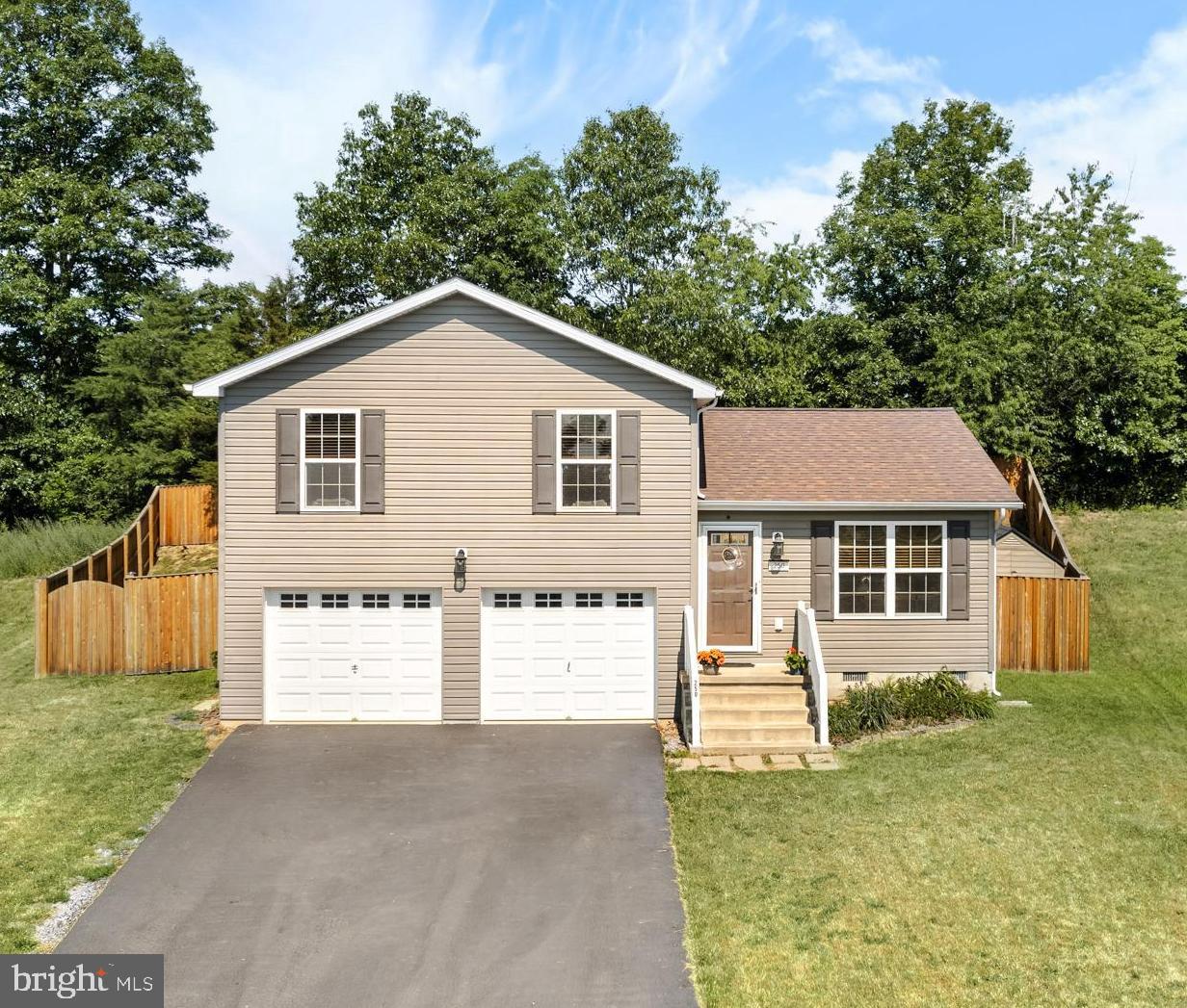 You are not going to want to miss this opportunity! This beautiful split-level home has 3 bedrooms and 1.5 bathrooms, is located at the end of a private, quiet cul de sac. The whole house received new carpet January 2024 and was power washed during the fall of 2023. It comes equipped with a new oven/range purchased in 2022, dishwasher, garbage disposal, and refrigerator with ice maker. The water heater is brand new, installed in October of 2023.  This home is fiber optic internet capable. The private backyard faces a tree line and includes a deck and new gazebo which covers a well-maintained and luxurious 2021 Freeflow Spa hot tub with its own dedicated outlet. These are surrounded by a 6ft privacy fence, built in 2021 which is perfect for pets or children. The driveway has been newly paved for easy access to the 2-car garage with automatic door openers. There is also a 7x7 ft Resin Weather Resistant Outdoor Garden Storage Shed that conveys and a reverse osmosis water system.  Owner does have a contract on a New Build and will need any offer to include a rent back to allow for moving.  HOA for this home is very Lax at the moment.
