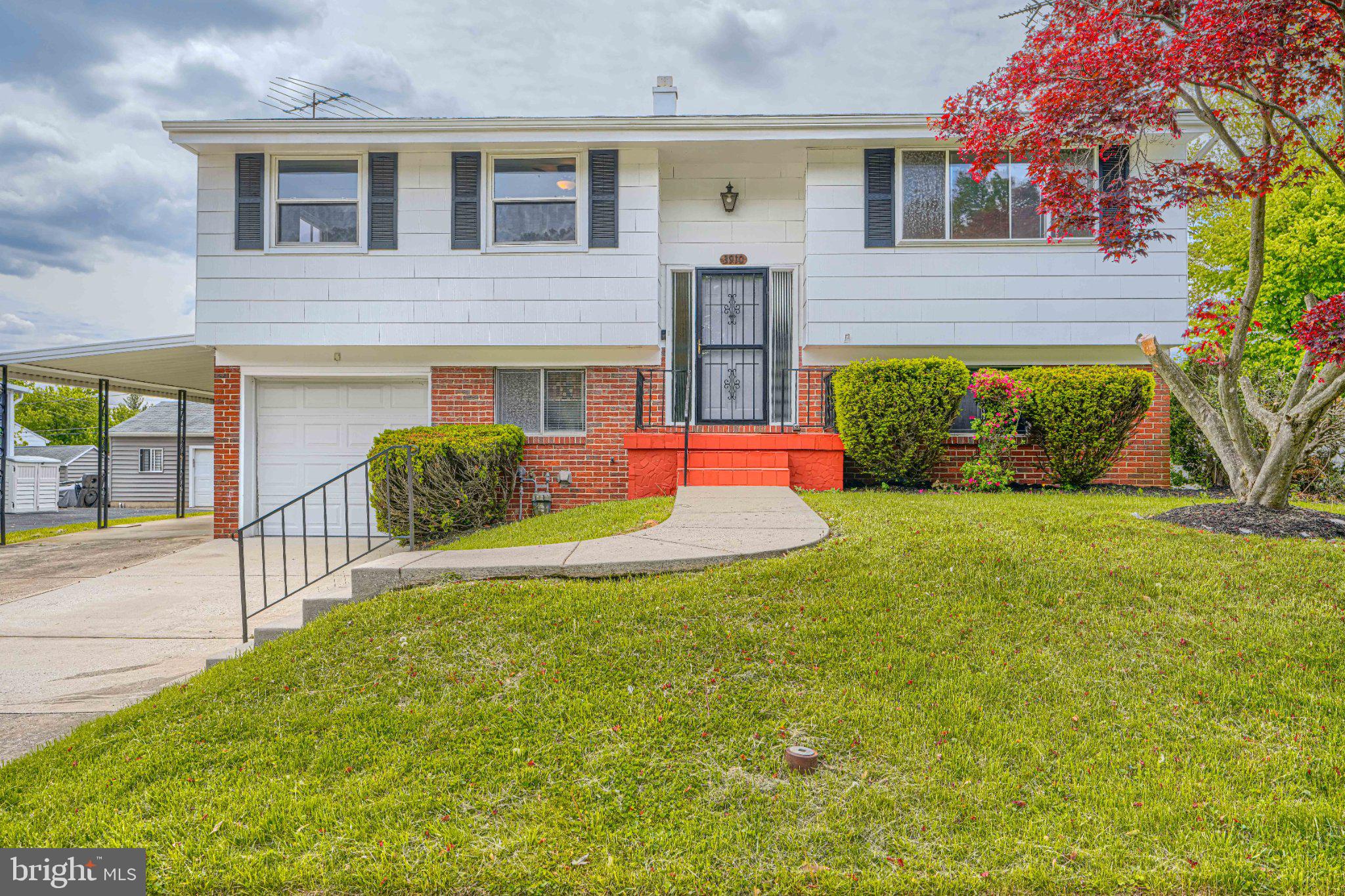 This stunning bi-level residence in the desirable Stoneybrook North subdivision offers a luxurious lifestyle with high-end features and modern conveniences. Originally built in 1968, the property underwent a major renovation in 2006, transforming it into a sophisticated living space that seamlessly blends style and functionality. Spanning 1,708 square feet, this home boasts three spacious bedrooms and a beautifully appointed full bathroom, featuring both a tub shower and a walk-in shower for a spa-like experience. The interior is designed for comfort and elegance, with a combination dining and living area that invites relaxation and entertaining. The eat-in kitchen is a culinary enthusiast's dream, equipped with premium appliances including a built-in microwave, dishwasher, disposal, and a refrigerator, ensuring every meal is a delight. Natural light floods the home, accentuated by ceiling fans that enhance the airy atmosphere. The fully finished basement provides additional living space, perfect for a home office, entertainment area, or guest suite, catering to a variety of lifestyle needs. Step outside to discover the exterior features that elevate this property. The expansive deck is ideal for outdoor gatherings, while the well-maintained yard offers a play area, perfect for leisure and recreation. The property is equipped with exterior lighting, enhancing both safety and ambiance during evening hours. Parking is a breeze with an attached garage, carport, and ample driveway space, accommodating multiple vehicles with ease. The lot spans 0.23 acres, providing a generous outdoor space for gardening or relaxation. This residence is not just a home; it's a lifestyle choice that combines luxury, comfort, and convenience in a sought-after community. Experience the perfect blend of modern living and timeless elegance in this exceptional property.