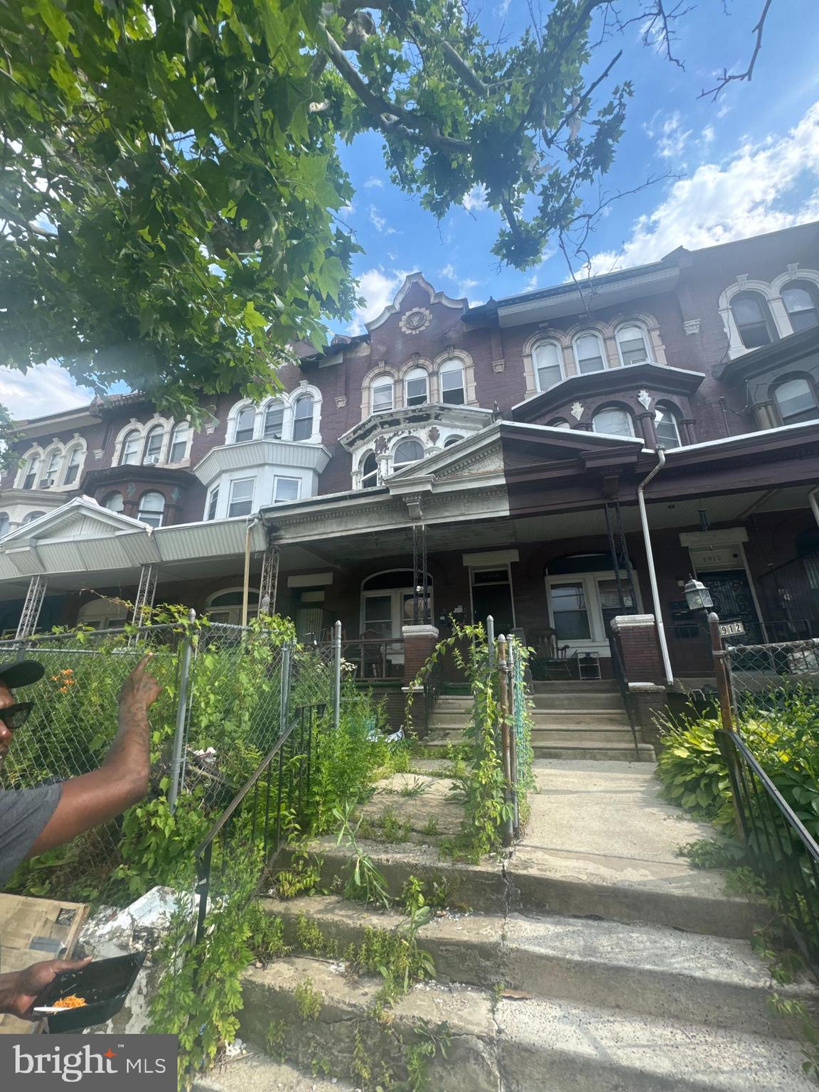 large 3 story shell in need of a complete renovation. Strong area. Blocks away from local hospital, schools, business and shops.