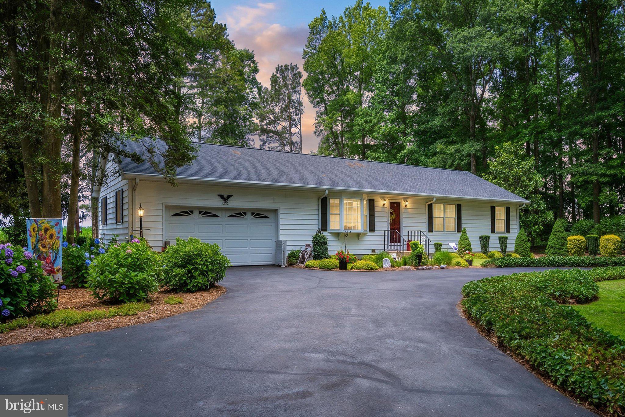 Set on 1.17± acres just outside historic Snow Hill, this meticulously maintained ranch-style home offers the ease of one-level living with thoughtful updates that provide peace of mind for years to come. Surrounded by mature trees with views of surrounding farmland, the property offers a quiet rural setting while remaining just minutes from town.

Inside, the home features approximately 1,456 square feet with three bedrooms, two full baths, comfortable living spaces, and a functional kitchen with bar seating and attached dining area designed for entertaining and everyday living. A gas fireplace creates a welcoming focal point in the living room during the cooler months. 

Major improvements have recently been completed, including a brand new architectural shingled roof replaced in 2026 complete with gutter guards, a new HVAC system replaced in 2024, and a completely new septic system installed in 2026. For added confidence during unexpected weather, the home is also equipped with a whole-house backup generator, helping keep essential systems operating during power outages.

Outside, you'll find an attached two-car garage complete with separate gas heat, a spacious asphalt driveway with generous parking, established landscaping, patio space for outdoor enjoyment, and additional outbuildings that offer flexibility for added storage, hobbies or yard equipment. 

Conveniently located minutes from Snow Hill's local shops, restaurants, and access to the Pocomoke River, the property is also just a short drive to Public Landing, where boating, fishing, kayaking, and scenic waterfront sunrises and sunsets await. Combining recent mechanical updates, practical amenities, and a peaceful Worcester County setting, this move-in-ready property is ready for its next owner.