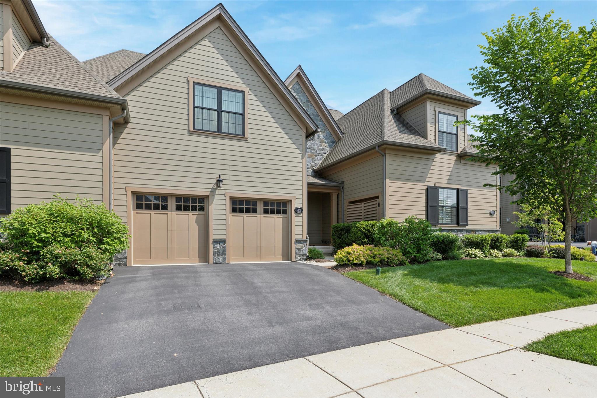 Welcome to 6106 Creekside Drive in Flourtown, the barely 6 years young carriage home,  located in the prestigious Reserve at Creekside.  This charming home is  situated between the two Philadelphia Cricket Club golf courses, giving you  amazing views of play and a picturesque setting.  The Gowen model features over 4.228 square feet of living space on 3 levels, this house is perfect for anyone who loves a roomy and comfortable living environment.

As you enter into the home you notice the open layout that  makes this home so airy and inviting.  The oversized foyer features the practicality of a modern mudroom and leads you to the main living space including the formal dining room, large living room with extra space for a card table or working area right next to the expansive chef's kitchen featuring upgraded cabinetry & counter tops, all upgraded appliances, a large pantry and even a separate bar area for all of your entertaining needs.  Notice the oversized island, seats at least 4 comfortably!!!   Head outside to the deck where you see the amazing views... of both Philadelphia Cricket Club golf courses!!!  This floor is complete with coat closets and beautiful powder room.
Notice the upgraded hardwood floors throughout the main floor and up the beautiful staircase!

Head upstairs where you will find the Main suite through the double doors, featuring a large sleeping area, huge walk-in closet and a bathroom to wow any King & Queen.  This bathroom features double sinks, beautiful tiled double shower, gorgeous free-standing tub, make-up station for a Queen and a separate water closet.  The second and third large bedrooms are found on the second floor, along with a beautiful hall bathroom(with some pretty special Tibaut wallpaper) and laundry room.  

Head down to the lower level where you find the perfect Man Cave and/or Oasis.  The space is being used for lots of fun TV hangout time along with a large pool table area(the sellers would like to leave the pool table).  You will find the 4th large bedroom, full bathroom,  a private "nook" for a massage room or workout space.  There is access to the lower patio with direct views of the golf course along with lots of storage available to finish off the lower level.  

Don't miss the quiet location along the outer side of this neighborhood, bordering along the Philadelphia Cricket Club golf course.    The neighborhood is convenient to the Philadelphia Cricket Club,  Erdenheim Farm,  Ft Washington train station, Flourtown shopping and so much more.  It's truly a special part of Whitemarsh Township to live and enjoy.