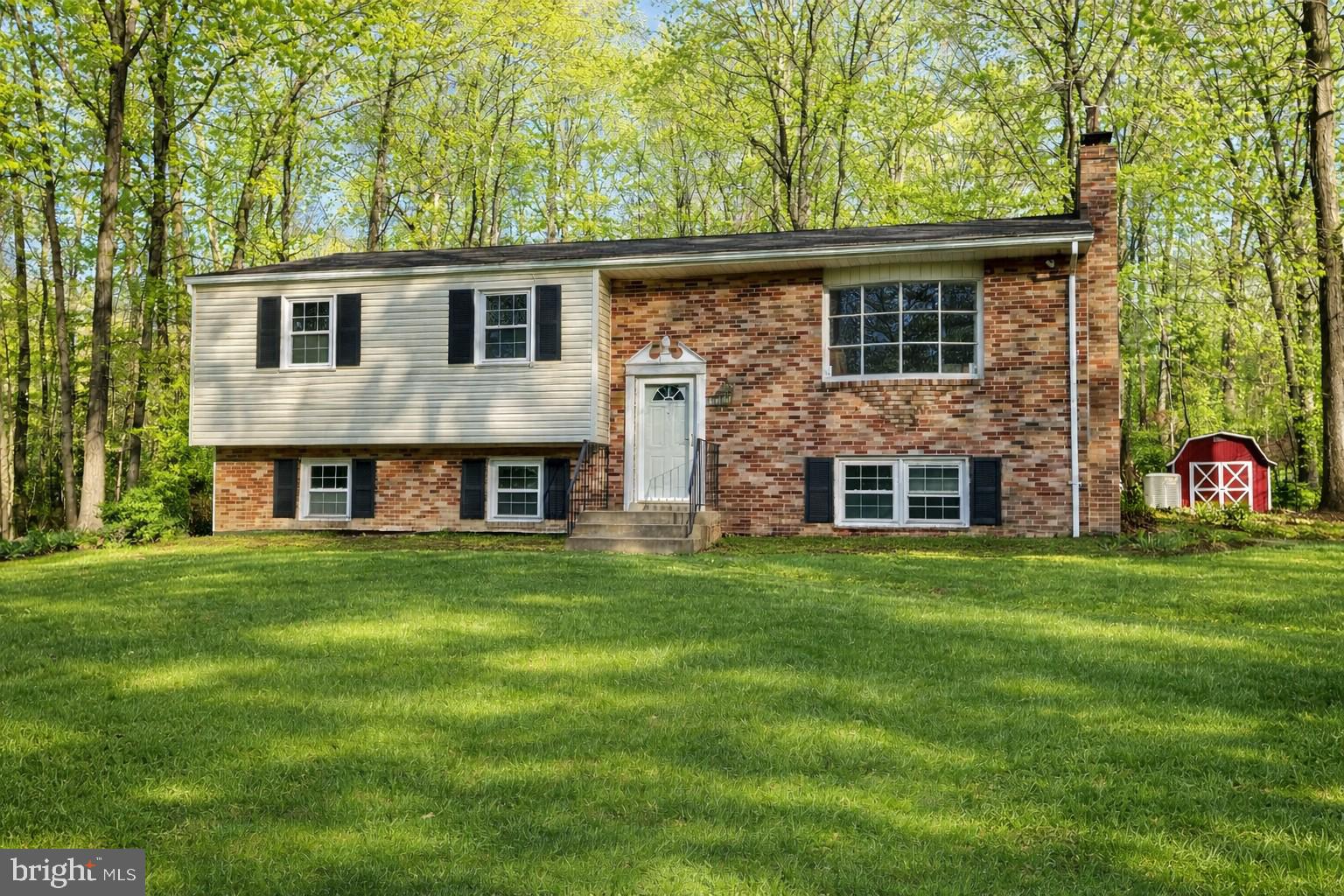 Welcome to 9350 Mathir Drive in La Plata, Maryland—an exceptional newly remodeled home set on a spacious 2-acre lot with no HOA and no town taxes. This versatile property offers two brand-new kitchens with custom all-wood cabinets with soft close features, one on each level, making it ideal for multi-generational living or added flexibility. With five bedrooms and two full bathrooms, the layout provides generous living space designed for comfort and functionality.
The home features all hardwood throughout the main level and waterproof luxury vinyl plank flooring in the lower level with no carpet, creating a clean, modern feel that’s easy to maintain. Additional highlights include a convenient carport and a Generac backup generator for peace of mind year-round. Surrounded by open space yet close to local amenities, this property delivers privacy, practicality, and modern upgrades in a desirable La Plata location.