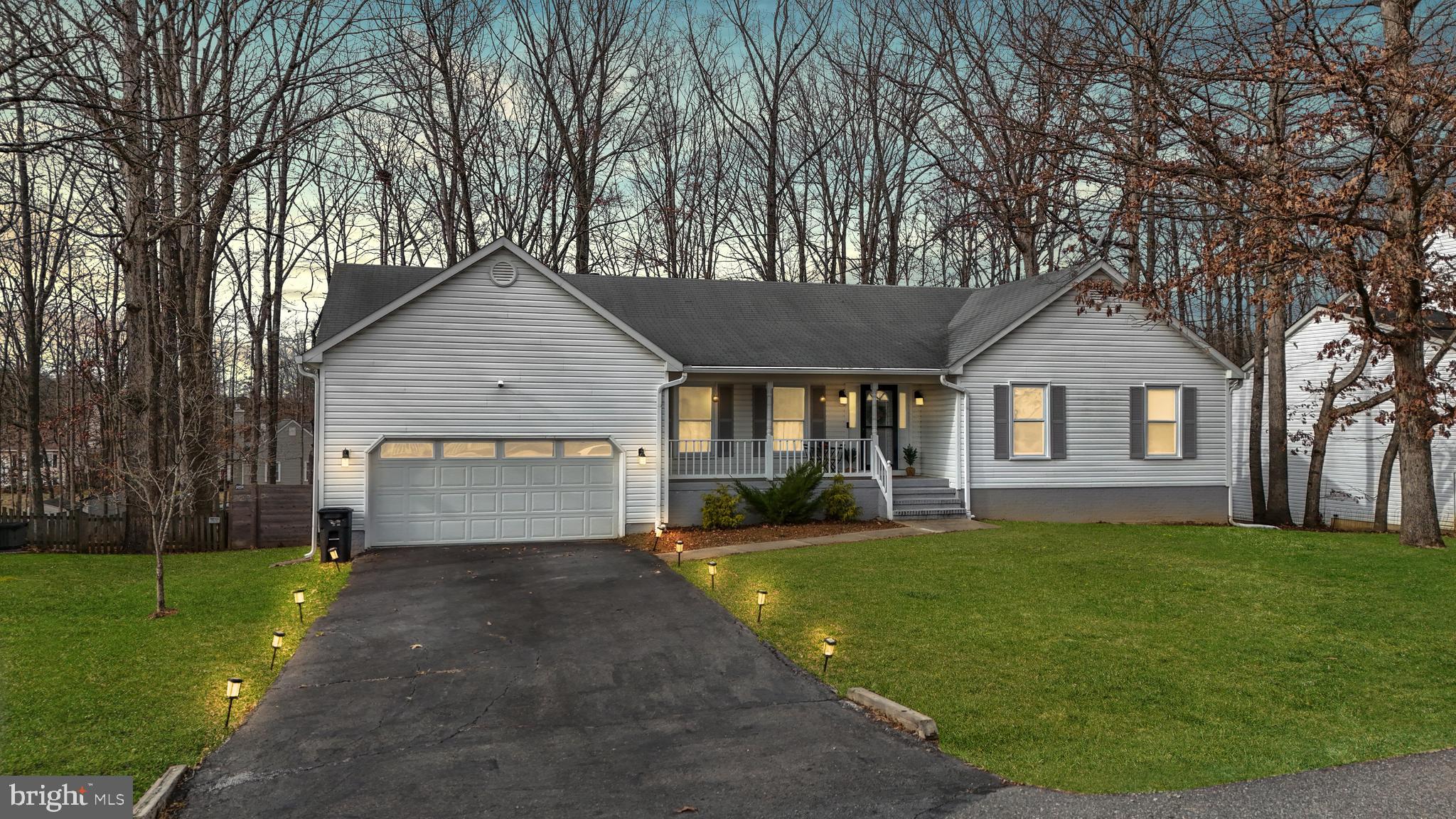 Welcome to this beautifully upgraded 4-bedroom, 3-bathroom rambler in the sought-after Smoketree community of Spotsylvania! With over 3,500 square feet of thoughtfully designed space, this home is all about comfort, convenience, and a lifestyle that embraces both relaxation and entertainment. From the welcoming front porch to the oversized rear deck, every corner of this home invites you to slow down and enjoy life.

Step through the front door, and you’re immediately greeted by a bright and airy living room just off the foyer—a perfect spot for welcoming guests or enjoying a quiet morning with a cup of coffee. The heart of the home is the spacious kitchen, where stainless steel appliances, abundant cabinet space, and a cozy breakfast nook create an ideal space for everything from casual meals to meal-prep marathons. The kitchen flows effortlessly into the dining room and family room, creating an open yet distinct layout that makes hosting a breeze. Large windows and glass sliding doors let in an abundance of natural light and lead straight to the expansive deck—perfect for outdoor gatherings or just soaking up a little fresh air at the end of the day.

The main level is designed for ease and comfort. The generous primary suite features an ensuite bath and ample closet space, providing a peaceful retreat at the end of the day. Two additional bedrooms and a full hall bath offer plenty of room for whatever you need—guest space, a home office, or simply extra room to spread out.

But the perks don’t stop there. The finished walkout basement is a showstopper. With a huge recreation room, you have endless possibilities—set up a game room, a home theater, or a personal fitness studio. A private fourth bedroom and full bath make the lower level a fantastic option for guests, in-laws, or an additional suite for privacy and convenience. And let’s not forget the dedicated storage room—because you can never have too much space for holiday decor, seasonal gear, and all those extras you want tucked away but easily accessible.

Step outside, and you’ll find even more reasons to love this home. The fully fenced backyard offers privacy and security, whether you’re entertaining friends, gardening, or simply unwinding in your own outdoor oasis. The oversized deck is the perfect spot for summer barbecues, stargazing nights, or crisp autumn mornings with a warm drink in hand.

And let’s talk about location—because this home delivers on that too. You’re just five minutes from Harrison Crossing and Central Park, putting shopping, dining, and entertainment right at your fingertips. Need to get somewhere fast? Quick access to I-95 makes commuting or weekend getaways a breeze.

This home is more than just a place to live—it’s a place to thrive. With thoughtful upgrades, ample space, and a layout that balances function with style, this Smoketree rambler is ready to welcome its next owner. Schedule your private tour today and see why this home is everything you’ve been waiting for!