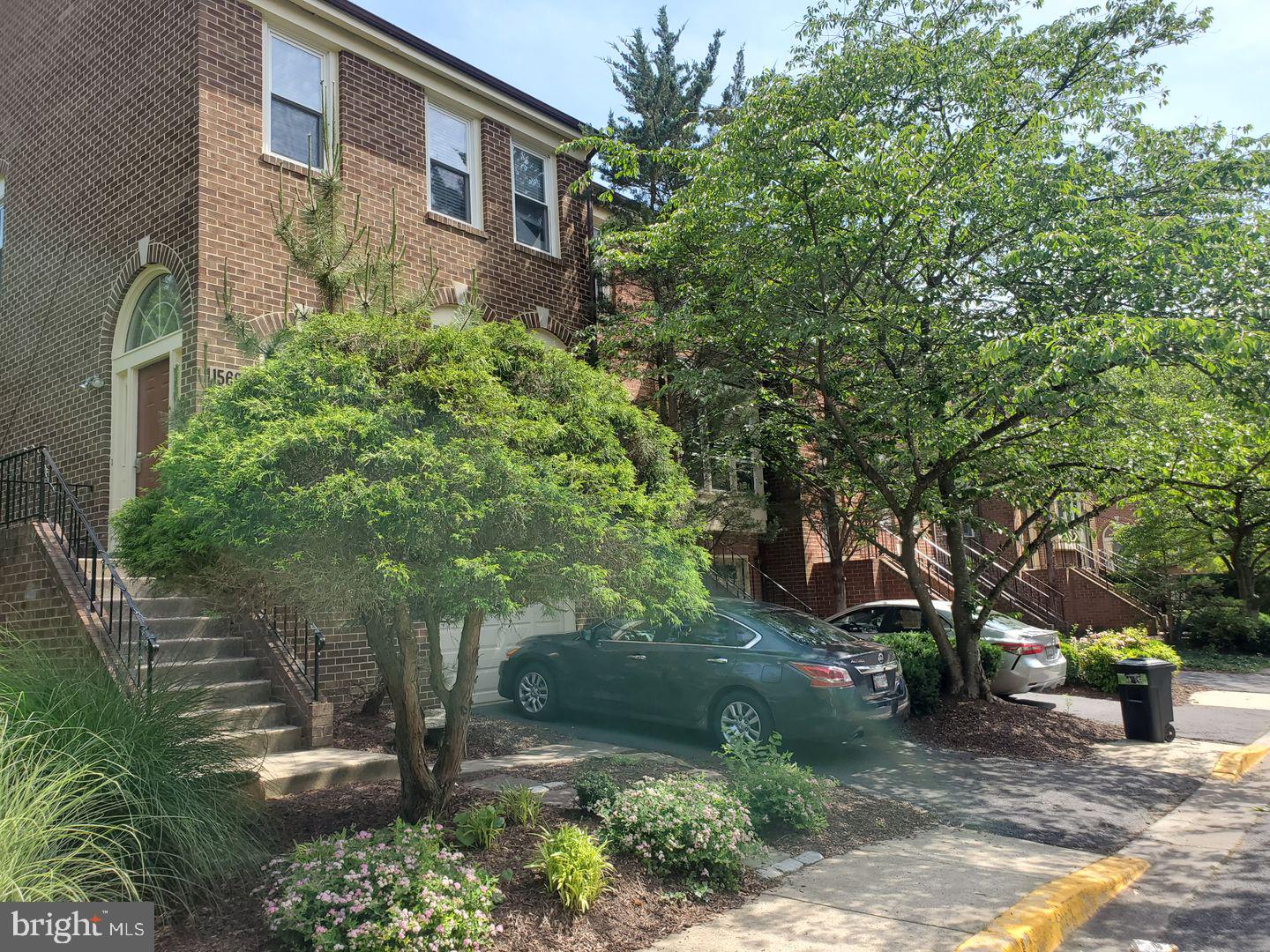 Welcome to 1569 Templeton Place, a distinguished end-unit townhouse nestled in the sought-after Woodmont Place community of Rockville, Maryland. This spacious residence offers 4 bedrooms and 3.5 bathrooms across three thoughtfully designed levels, providing an abundance of space and comfort for modern living.

As you enter, you're greeted by gleaming hardwood floors that flow seamlessly throughout the open-concept living and dining areas. The expansive layout is bathed in natural light, creating a warm and inviting atmosphere. The updated kitchen features granite countertops, modern appliances, and ample cabinetry, making it a chef's delight. A convenient half-bath completes this level.

The upper level houses three generously sized bedrooms, including the primary suite. The primary bedroom boasts a spacious walk-in closet and a private ensuite bathroom, offering a serene retreat. Two additional bedrooms share a well-appointed full bathroom, ensuring comfort for family members or guests.

The fully finished lower level offers versatility with a fourth bedroom and a full bathroom, making it ideal for a guest suite, home office, or recreational space. A cozy masonry fireplace adds a touch of warmth, and glass sliders provide direct access to the private backyard, enhancing indoor-outdoor living.

Residents of Woodmont Place enjoy a low HOA fee of $126 per month, which covers common area maintenance, fostering a well-kept and welcoming environment. The community is conveniently located near major commuter routes, including I-270 and the Rockville Metro Station, ensuring easy access to Washington, D.C., and surrounding areas. Top-rated Montgomery County Public Schools, such as Beall Elementary, Julius West Middle, and Richard Montgomery High School, serve the area, providing excellent educational options.

This home combines elegance, functionality, and an unbeatable location. Don't miss the opportunity to make 1569 Templeton Place your new address. Schedule a tour today and experience all that this exceptional property has to offer.