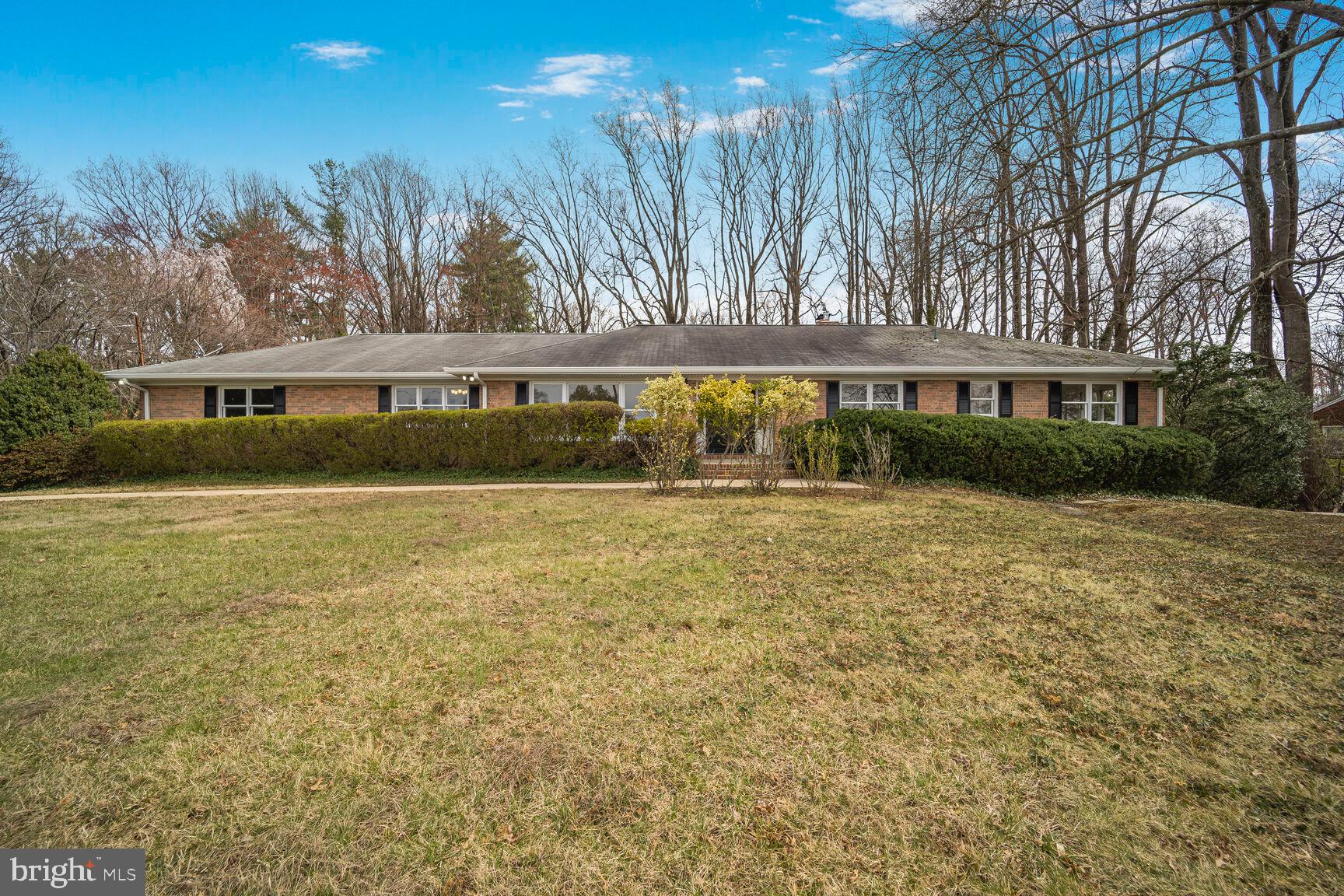 Located in the sought after Brook Hills Estate neighborhood in Annandale, this sprawling 5BR/3.5BA rambler unveils a harmonious blend of comfort and elegance, sitting on a large one acre lot. 
As you walk in, the heart of the home is the inviting family room, adorned with a cozy fireplace that adds warmth and ambiance. Adjoining the family room is the fully equipped kitchen, making it ideal for entertaining guests or preparing meals. Walking out of the family room, the expansive patio and deck offers a perfect spot for al fresco dining, summer barbecues, or simply relaxing and enjoying the fresh air, where you can bask in the tranquility of the private backyard.
The large living room and adjacent dining room offer more options to entertain, enjoy a quiet time at home, and build memories with your loved ones. The laundry room across the hallway offers an extra convenience on this level.
On the other side of the foyer, the main level of the home features three well-proportioned bedrooms and two full bathrooms and a powder room, providing ample space for rest and relaxation. The primary bedroom is a true sanctuary, boasting an en-suite bathroom and a large walk-in closet. The additional two bedrooms are equally comfortable and share access to a full bathroom. 
Descend to the lower level to discover a fully finished basement that adds even more living space to this exceptional home. Here, you will find two additional bedrooms, perfect for guests, and a home office. A spacious recreation room offers endless possibilities for entertainment, whether it's movie nights, game days, or simply gathering with loved ones. An additional kitchen and full bathroom add convenience and functionality to the basement level. 
Outside, the property boasts an attached two-car garage and ample driveway parking, ensuring there's always a place for your vehicles. 
In terms of location, this rambler is ideally situated within a short distance of the Beltway with easy access to anywhere in the metro area. For those who love shopping, dining, and entertainment, the bustling towns of Annandale and Springfield are just a short drive away. 
Whether you're looking to raise a family, entertain guests, or simply enjoy a serene lifestyle, this home is sure to exceed your expectations.
Offer deadline: Tuesday, April 1st at 3:00 pm.