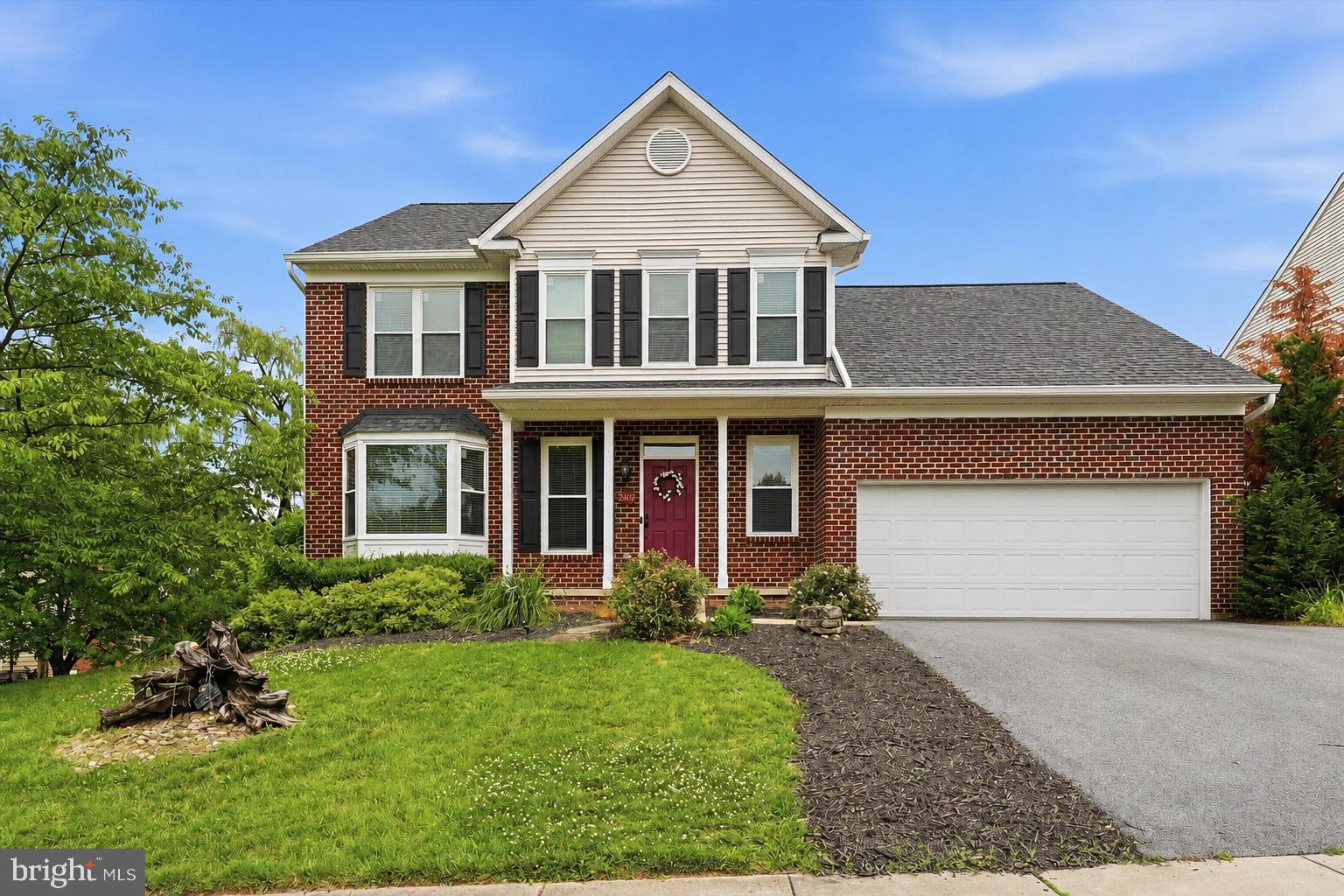 Welcome home to this spacious 4-bedroom, 2.5-bath brick-front home, ideally situated on a large corner lot in the sought-after Whittier community.  From the moment you enter, the warm hardwood flooring in the foyer welcomes you and flows seamlessly into the main-level powder room and hallway leading to the heart of the home. ***

The spacious living and dining room combination provides the perfect setting for entertaining family and friends. The inviting, open-concept kitchen features a center island and overlooks the oversized family room, creating the ideal gathering space for everyday living.  Step outside onto the deck, perfect for grilling, relaxing, and enjoying peaceful evenings overlooking the fenced, lush backyard. ***

Upstairs, you’ll find a private primary suite retreat complete with a walk-in closet, dual-bowl vanity, and an en-suite bath featuring a soaking tub and separate shower.  Three additional generously sized bedrooms and a full bathroom complete the upper level. ***

The finished lower level offers even more living space with a versatile recreation room and separate office—perfect for working from home or creating your own private retreat.  The walk-out leads to the patio and lush backyard, offering even more space to relax and enjoy the outdoors.  ***

Whittier offers an exceptional lifestyle with wonderful community amenities, including a swimming pools, basketball and tennis courts, tot lots, Whittier Lake and scenic walking path, and a convenient neighborhood shopping center.  ***

Ideally located just minutes from shopping, dining, and major commuter routes, this home combines comfort, convenience, and the vibrant Whittier lifestyle.