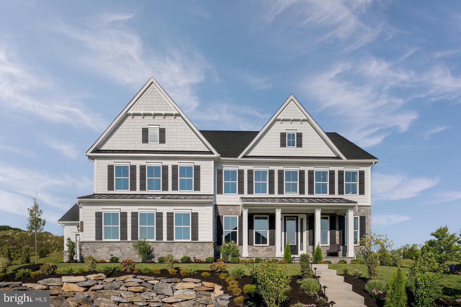 Only 3 homesites left! This is your chance to live in the only new estate homes in an ideal Glen Mills location! Welcome to Brinton Lake Estates, an exclusive enclave of luxury estate homes tucked away adjacent to the Shoppes at Brinton Lake. The Santorini is a luxury single‑family home offering a 3‑car garage and thoughtfully designed living space. A grand foyer is flanked by a formal dining room and flexible living space, with a private study ideal for remote work. The gourmet kitchen features a large island and opens to the dining area and impressive two‑story family room. Standard features include 9’ ceilings and 8’ doors on all levels, quartz countertops, soft‑close cabinetry, and wide‑plank hardwood flooring.  A covered porch provides additional outdoor living space. With five bedrooms included, this home offers ample space for family and guests, including the lower‑level bedroom. The upper level features three bedrooms, each with ensuite baths and walk‑in closets. The owner’s suite includes dual walk‑in closets and a spacious bath with dual vanities. A finished basement adds additional living and entertaining space.