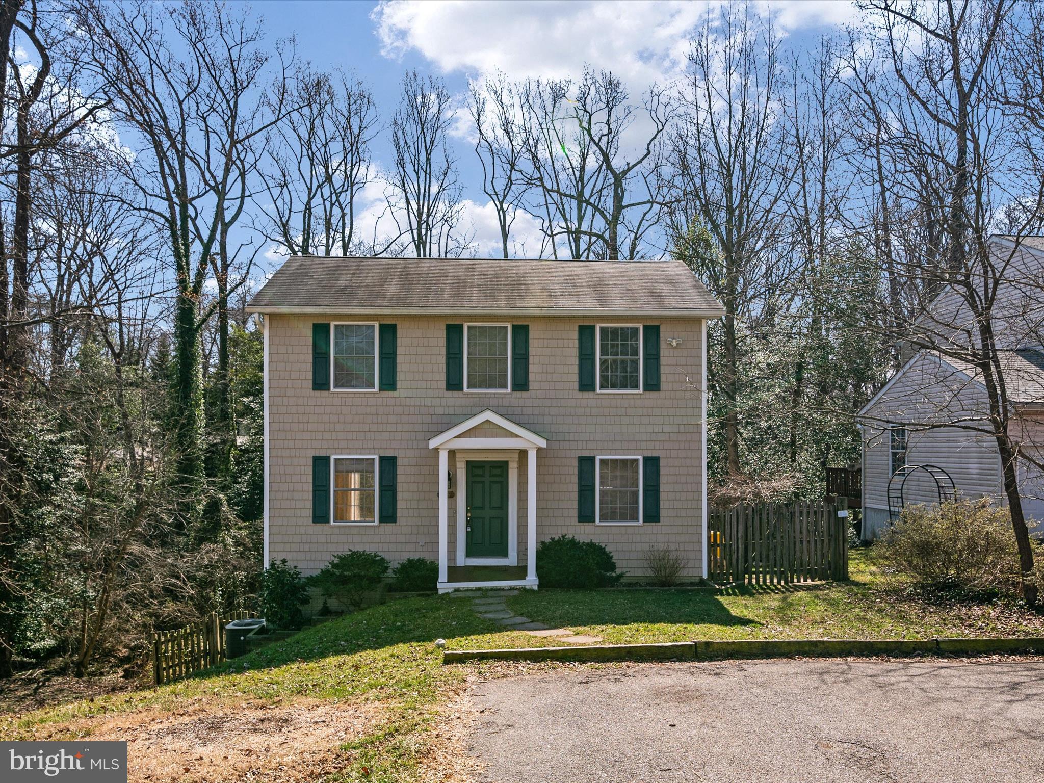 Welcome to your dream home in the picturesque community of Herald Harbor in Crownsville, Maryland! This impeccably maintained home offers turn-key convenience while also allowing the opportunity for a new owner's touch. The main level features a gourmet, eat-in kitchen with granite counters and a breakfast bar with additional seating. The light filled living space opens to a large deck with ample room for entertaining. Back inside, the upstairs provides 3 large bedrooms with a shared full bath. Heading to the basement you will find a second living space that has multi uses such as a recreation room or office space along with the 4th bedroom and additional full bath.  The property is nestled in the heart of the community backing to a wooded lot that is included in the sale of the home. Don't miss this opportunity to make this home yours!