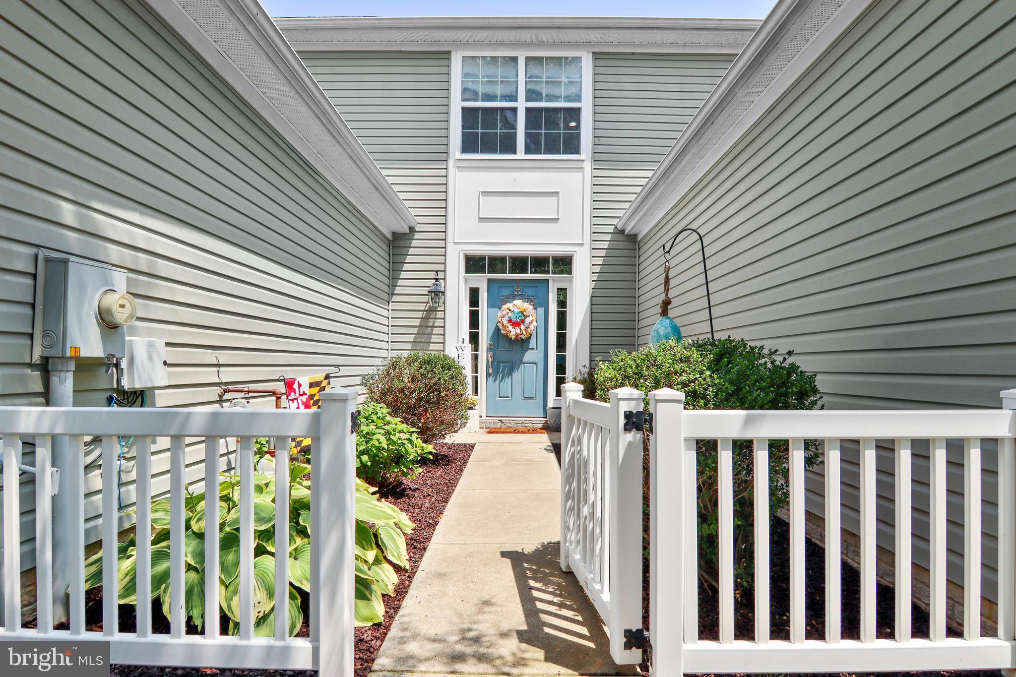 Enjoy low-maintenance living in this well-maintained 3-bedroom, 2.5-bath townhome located in the desirable Lakelands community. Offering a spacious and versatile floor plan, the kitchen is equipped with stainless steel appliances and opens seamlessly to the main living area, with a cozy gas fireplace. The first-floor primary suite provides easy main-level living and features a private full bath and walk-in closet. Upstairs, you'll find two generously sized bedrooms and a large loft that can serve as a family room, game room, home office, or flex space. An unfinished room above the garage offers abundant storage. HVAC replaced in 2025. Additional features include multiple storage closets, a dedicated laundry room, a two-car garage, and a fully fenced backyard with patio ideal for outdoor entertaining, pets, or gardening. Take advantage of the community pool and enjoy all the benefits of townhome living in a welcoming neighborhood.