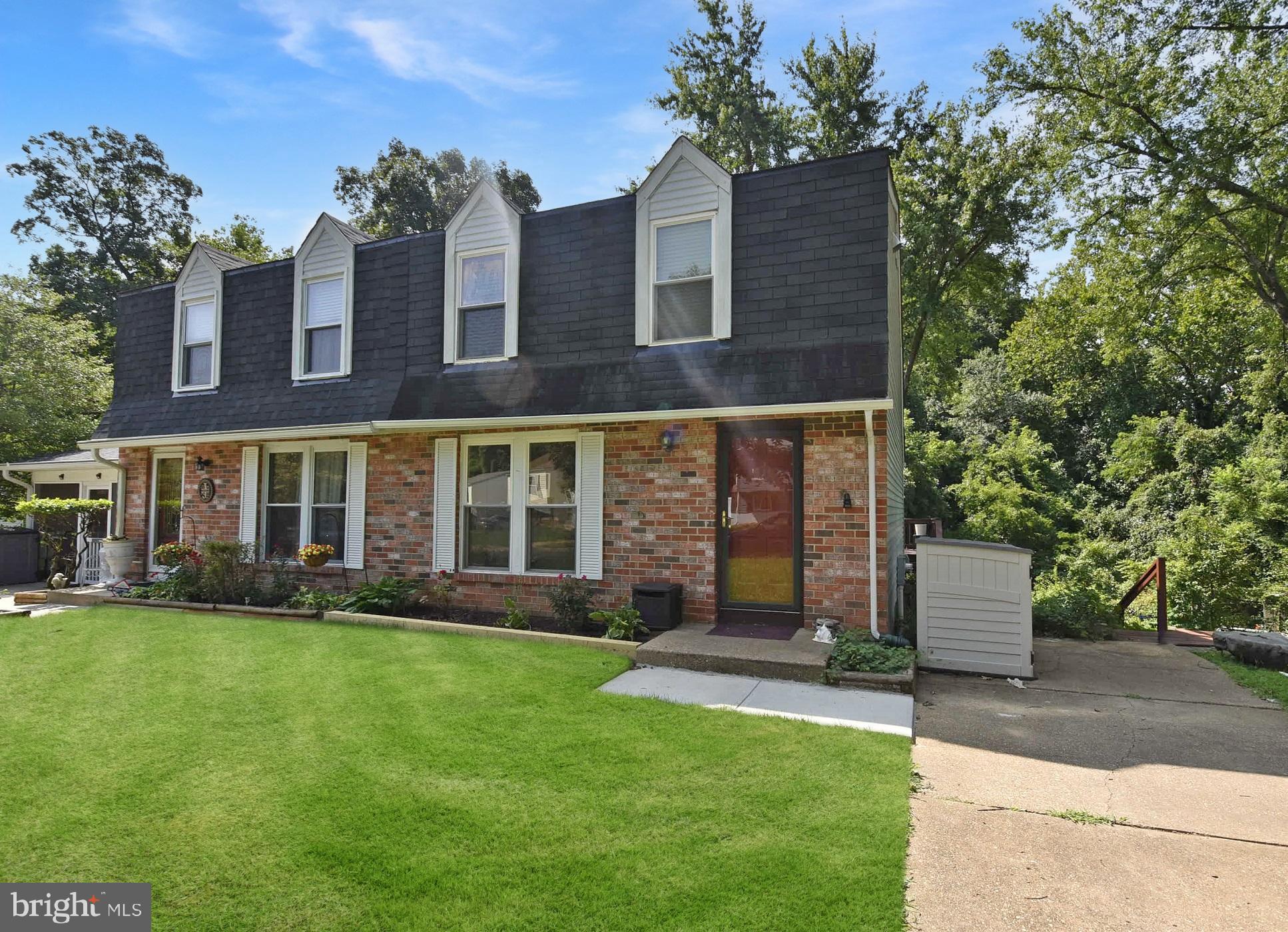 Welcome to 413 Blossom Tree Court, a beautifully cared‑for duplex in the highly sought‑after Whispering Woods community on the Broadneck Peninsula. This lovingly maintained 3‑bedroom, 2‑full‑bath home offers a functional layout, thoughtful updates, and exceptional access to parks, trails, and everyday conveniences.

The main level features a bright, renovated (2023) kitchen with granite countertops, stainless steel appliances, and abundant natural light. A dedicated dining area flows seamlessly into the kitchen, with expansive sliders opening to a private deck overlooking a large backyard and lush wooded views—an ideal setting for play, gardening, entertaining, or simply relaxing in your own outdoor retreat.

Upstairs, you’ll find three comfortable bedrooms, including a spacious primary with double closets, and a tastefully renovated full hall bath (2023) conveniently located for all bedrooms.

The partially finished lower level offers outstanding flexibility with a full bathroom, making it perfect for a guest suite, 4th bedroom, recreation room, or home office. The unfinished portion includes the laundry area, utilities, and direct walk‑out access to the backyard, providing convenience and excellent potential for future expansion. Opportunities include adding a lower‑level patio or a three‑season room beneath the existing deck.

Additional features include hardwood‑look laminate flooring throughout, new HVAC (2023), and a hot water heater (2000).

Whispering Woods offers a low HOA of just $347/year, playgrounds, walking paths, and easy access to the newly completed Broadneck Peninsula Trail. From your front door, you can bike or walk to grocery stores, restaurants, the library, Broadneck Park, and even Sandy Point State Park.

Located on a quiet, less‑dense street within the community, this home provides exceptional convenience to Route 50, Route 2, and Route 97, with an easy commute to Baltimore, Washington, the Bay Bridge, the Naval Academy, and historic Annapolis.

Situated in the award‑winning Broadneck school district, this is a wonderful opportunity to own a well‑loved home in one of Broadneck’s most desirable neighborhoods.