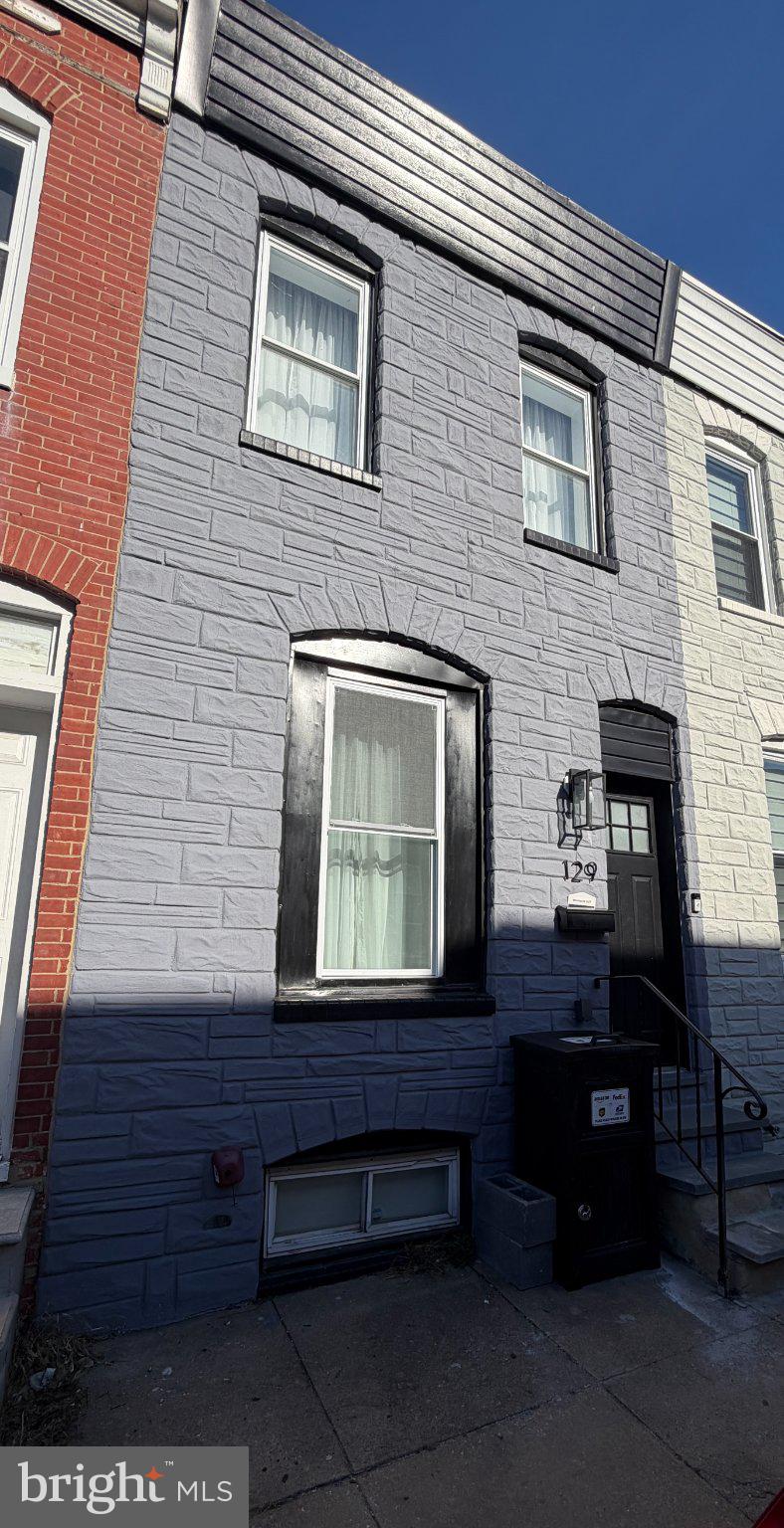 Welcome to this beautifully move-in-ready, updated Baltimore rowhome offering the perfect blend of space, style, and convenience. The main level flows effortlessly—ideal for both everyday living and entertaining—leading into a stylish kitchen with ample cabinetry and room to gather. Upstairs, you’ll find generously sized bedrooms along with 2 full bathrooms, providing comfort and flexibility for any lifestyle. The fully finished basement adds valuable living space, perfect for a guest suite, home office, gym, or entertainment area. Step outside to your private backyard—ideal for relaxing evenings or hosting friends. All of this in a location that truly delivers—just minutes from Patterson Park, the vibrant waterfront at Canton Waterfront Park, and the shops, dining, and nightlife of Fells Point. Whether you're a first-time buyer or looking to invest, this move-in-ready home offers incredible value in one of Baltimore’s most sought-after areas.
