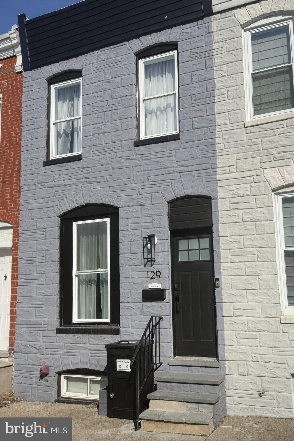 Welcome to this beautifully move-in-ready, updated Baltimore rowhome offering the perfect blend of space, style, and convenience. The main level flows effortlessly—ideal for both everyday living and entertaining—leading into a stylish kitchen with ample cabinetry and room to gather. Upstairs, you’ll find generously sized bedrooms along with 2 full bathrooms, providing comfort and flexibility for any lifestyle. The fully finished basement adds valuable living space, perfect for a guest suite, home office, gym, or entertainment area. Step outside to your private backyard—ideal for relaxing evenings or hosting friends. All of this in a location that truly delivers—just minutes from Patterson Park, the vibrant waterfront at Canton Waterfront Park, and the shops, dining, and nightlife of Fells Point. Whether you're a first-time buyer or looking to invest, this move-in-ready home offers incredible value in one of Baltimore’s most sought-after areas.
