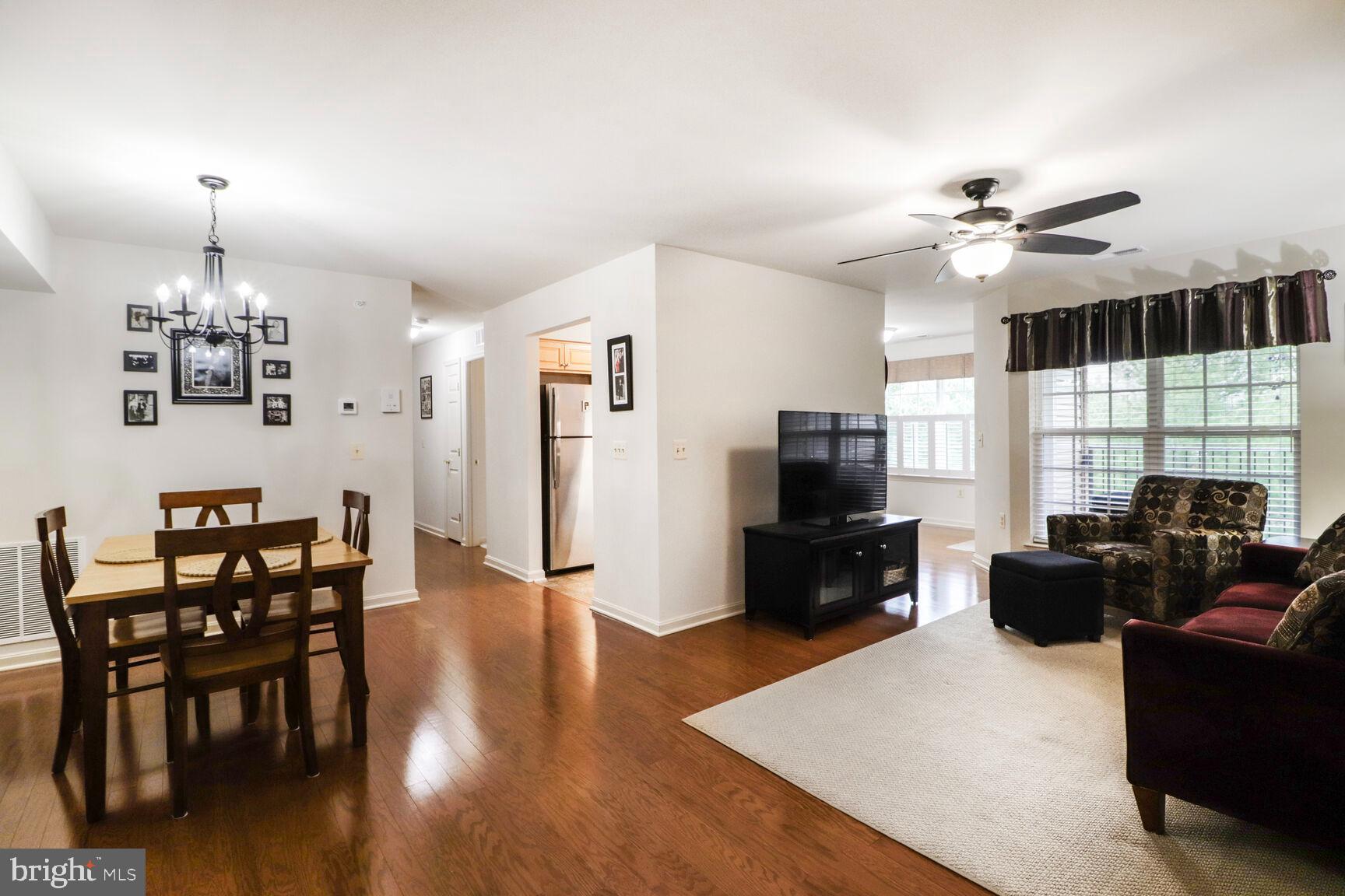 The Good Life Awaits With This Exceptional, Top Level, Wembley Square Condominium Home In Secured, Elevator Building With Great Location. Upgrades Throughout Including Flooring, Cabinetry, Appliances, Lighting Fixtures & Faucets. All Ages Are Welcome & Let Others Do The Grass & Snow! Features Auburn Oak Floors, Maple Kitchen With Granite Counters, Tile Backsplash, & Stainless Appliances, Cozy Breakfast / Sun Room, Primary Bedroom With Full Bathroom & Walk-in Closet, & Rear-facing  Private Balcony With Storage Area. Schedule Your Appointment Today For Showings That Begin April 17th!