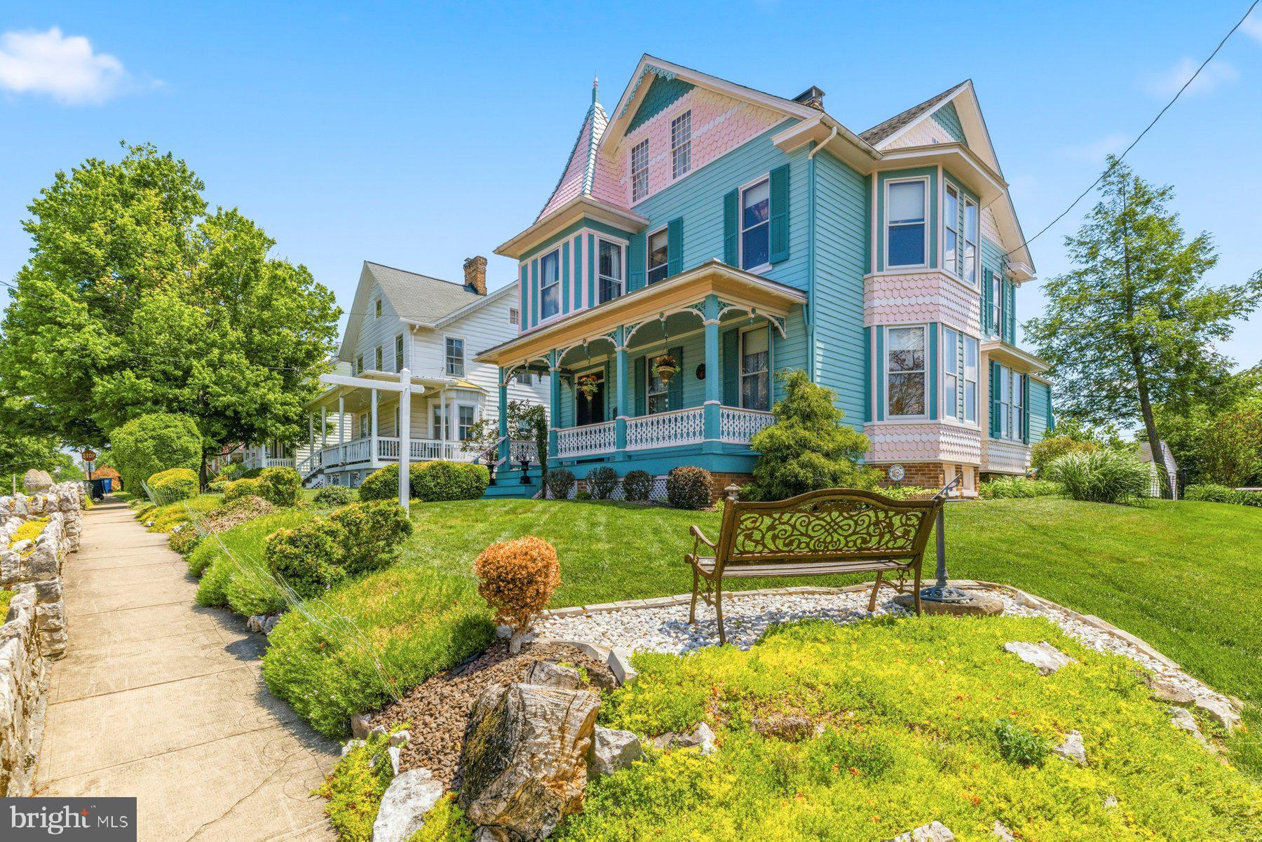 Discover this magnificently unique "Painted Lady" Victorian nestled in the heart of historic New Windsor! *Instant equity - this property recently appraised at $495K* Originally built in 1888, this home beautifully pairs the timeless charm of its 138-year backstory with modern updates for effortless comfort. This rare find features 3 bedrooms, 2 full baths, and a versatile bonus room upstairs—perfect for a dedicated work-from-home space. Inside, dual staircases add a touch of historic character and architectural flair, while a large attic and a walk-out basement provide abundant extra storage. At the heart of the home, the modern kitchen features beautiful cabinets proudly produced and crafted just down the road right here in New Windsor. Outside, enjoy a meticulously manicured yard and a detached, fully powered one-and-a-half-car garage with convenient rear-alley entry and parking for up to four vehicles. Brimming with original character and completely move-in ready, this one-of-a-kind beauty eagerly awaits its next owners. Schedule your tour today and make this authentic piece of history your own!