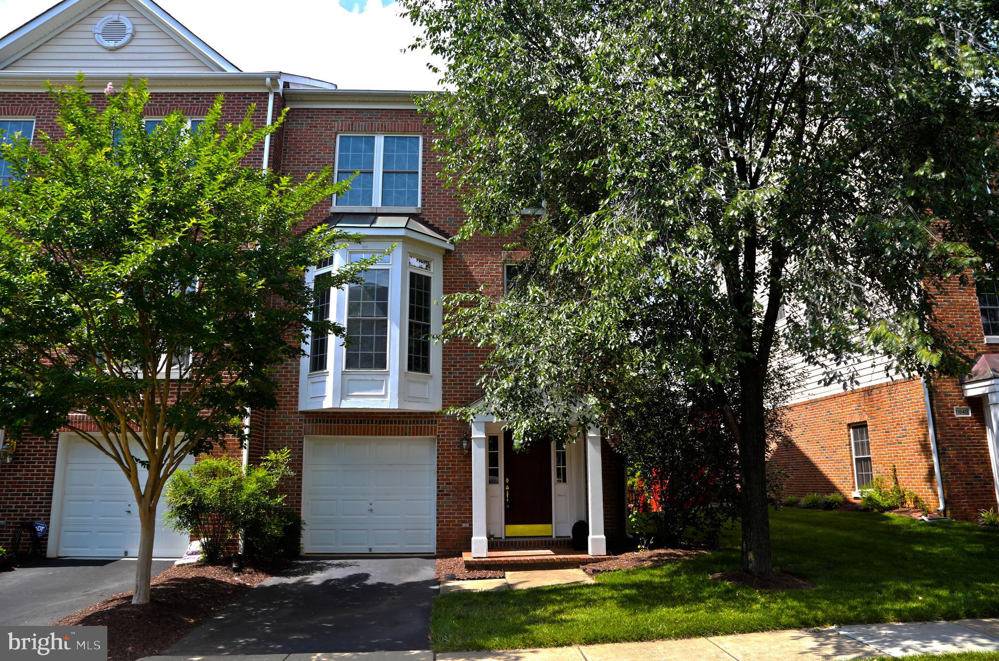 Extra light End Unit! Convenient location.  Deck off kitchen, Fenced yard with patio. 42"cabinets in the kitchen. Built-in wall oven. Double sinks, Separate shower and tub in master Bath. Fully walkout basement with full bath. Playground, tennis, basketball courts, pool. Across street to Wegmans. 10 min walk to Fairfax corner. Close to Fair Oaks Mall. Shuttle service to DC from Government Center with free parking. Available on 5/31/2025.