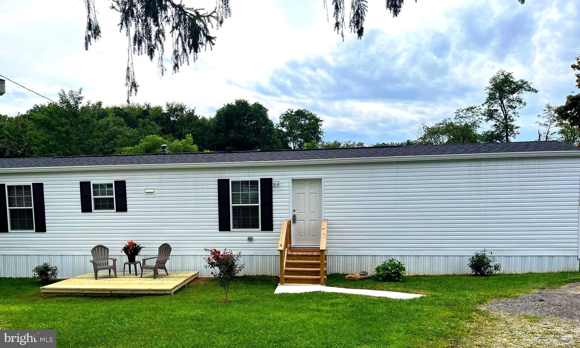 Beautiful  NEW Single Wide Mobile Home- 14x66- for sale in Hillandale Homes Mobile Home Park #1. 2 bedroom, 2 bath with an office and separate laundry/mudroom with washer and Dryer hookup. Wooden Patio waiting for you to make your own. Includes Shed in back for storage (shed is being sold as-is).  Brand new appliances w/manufactures warranty. Stove and Hot Water are Electric, HVAC is Propane. Vinyl plank flooring thru out with Retro fitted Sprinkler System. Refrigerator with ice maker hook up. Ground Rent is $708 per month which includes, water, sewer, trash removal 2x a week and snow removal of common areas. Must apply and be approved by Hillandale Homes Property Manager. Financing options are available. Contact Listing Agent for details.