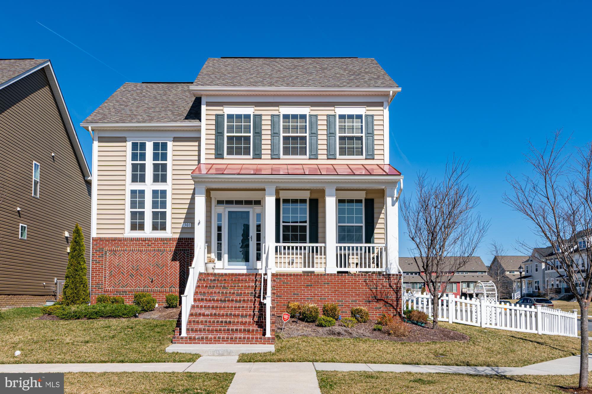 The Monroe II by Dan Ryan Homes. You're welcomed in from the covered front porch with charming views of the neighborhood including the original farmhouse, to a two story foyer with great windows that let in lots of light from the south. You will immediately notice the hardwood floors and the study with French doors on your right, upgraded gourmet kitchen with gorgeous painted maple cabinetry, granite countertops, stainless steel appliances and large island with breakfast seating. Charming dining area/morning room is located off the kitchen. The family room features a gas corner fireplace and is open to the kitchen as well. **Main level spacious primary suite with elegant bath and large walk-in closet with customized shelving for perfect one-level living.  This is a very practical floorplan with the laundry room, and a powder room towards the back of the home where you have the direct access to the attached rear-end 2-car garage with epoxy flooring. This will be your most utilized entrance, and there's only a small step into the home. Wonderful fenced-in yard with patio with lights, on this extra upgraded and wide high-vis lot with views of open grassy areas and charming houses. Note that this lot is one of the few with the fence from the front corner, allowing for a very large side yard. **The staircase going upstairs has two-story ceiling for great visual impact and light through the many windows. Upstairs features a charming loft space/secondary living room with open railing, two large bedrooms and a full bath. The basement features new LVP flooring and is expansive, featuring a finished rec room, and full bath as well as additional finished space, perfect for a craft room, additional guest space, gym etc etc. **Check out the utility room with new sump pump, new sewer sub meter and whole-house water softener and water filtration. **Wonderful location inside Brunswick Crossing too with all the amenities close by, such as swimming pool, fitness center, tennis courts, walking trails, many other sports fields like soccer, volley, baseball and basketball, dog park, tot lots and more. The stunning community center is available to rent for your private events. The MARC train station is right in Brunswick for easy commuting to DC, and there are several commuter roads that take you to NoVA and MoCo and beyond. The lawncare in the front and inside the fence is included as part of the HOA fees too! Grocery store a few blocks away and more retail for your convenience. Don't miss your chance to own this wonderful home.