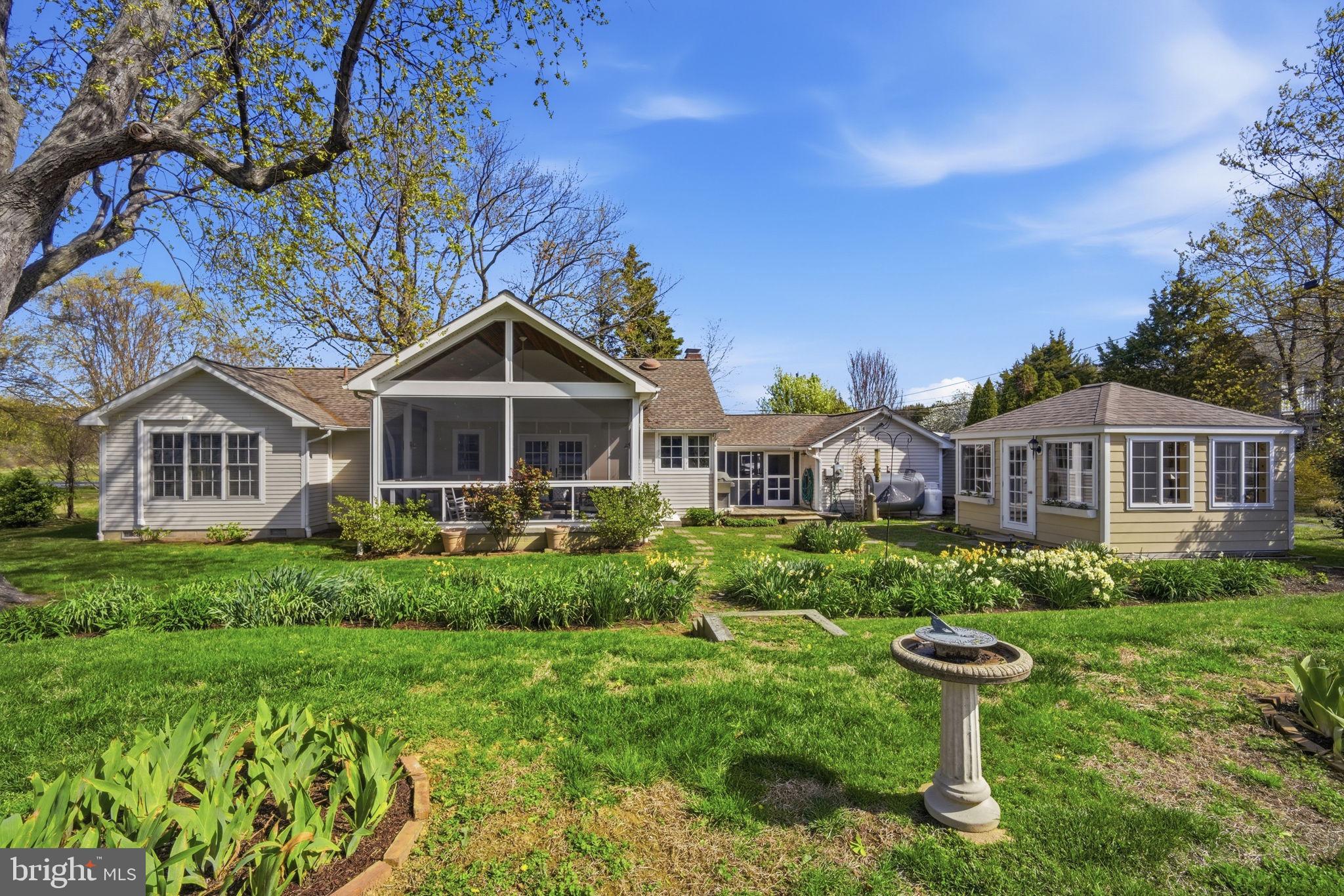 Charming 2-3BR/2BA coastal cottage with tranquil water views of Black Walnut Cove and the Choptank River - ideal for easy full-time living or a relaxed weekend retreat. Beautiful hardwood floors run throughout, complementing the home’s warm, welcoming character and comfortable scale. The living room, anchored by a wood-burning fireplace, offers a cozy gathering space, while the kitchen is thoughtfully designed with a large center island, wet bar, and French door access to a beautiful screened porch overlooking the cove - perfect for morning coffee, quiet afternoons, or casual evening entertaining. The primary suite is a peaceful retreat, featuring an ensuite bath, walk-in closet, and convenient laundry cubby. An adjoining second bedroom offers flexibility as a private office, sitting room, or additional sleeping space. A third bedroom and full hall bath provide comfortable accommodation for guests. Additional highlights include a garden shed and a fully conditioned “she shed” with heat and AC, currently used as an art studio – a versatile space for hobbies or creative pursuits. Numerous improvements include a new roof, Pella architectural windows, encapsulated crawlspace, 3-zone Mitsubishi mini-split system, reverse-osmosis water filtration, and more. This thoughtfully updated cottage offers the best of Eastern Shore living with a relaxed, waterside feel.