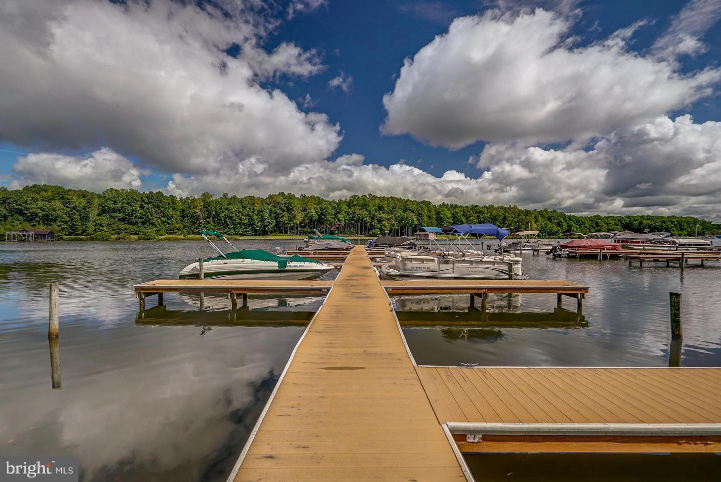 Build your dream home and start living the Lake Anna lifestyle! This beautiful 1.56-acre corner lot is located in Freshwater Estates on the public side of Lake Anna, VA. With your own assigned boat slip in the neighborhood common area, you'll have easy access to the lake whenever adventure calls. Whether you're ready to build now or years from now, there's no required timeline to build, giving you the flexibility to create your dream home at your own pace. Freshwater Estates is a well established community featuring attractive homes, a boat ramp, boat slips, and a lakeside picnic area for residents to enjoy. Conveniently located just minutes from the towns of Mineral and Louisa, you'll also be close to waterfront dining, marinas, shopping, golf, wineries, and all that Lake Anna has to offer. Bring your builder, your vision, and start planning your perfect lake retreat!