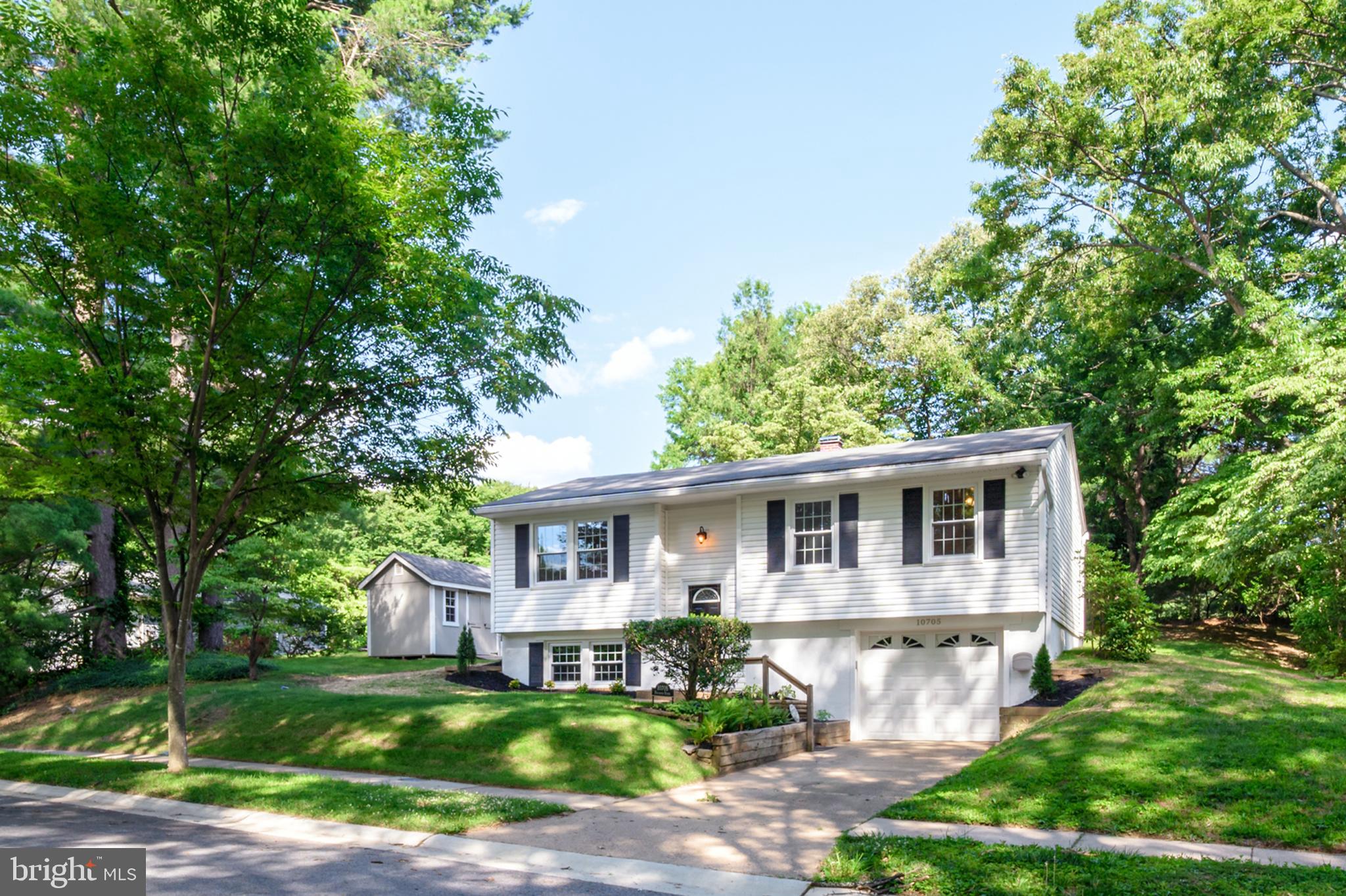 Welcome home to this well-maintained classic Columbia split foyer, offering timeless character with thoughtful updates throughout. Built in 1968, this home has been freshly painted and is move-in ready with updated bathrooms and comfortable living spaces. The main level features 3 bedrooms, a full bathroom, and a welcoming layout with plenty of room for everyday living. The lower level offers additional living space, a convenient half bathroom, and access to the finished garage with excellent storage space and flexibility for hobbies, a workshop, or more. Step outside and enjoy the spacious open backyard featuring a patio for outdoor gatherings, along with a large shed for additional storage. New windows in 2021; new HVAC & HWH in 2025; new roof, siding,soffits and shed in 2017. Located near beautiful Wilde Lake, enjoy nearby scenery, walking paths, nature, and all the conveniences that make Columbia such a sought-after place to call home.